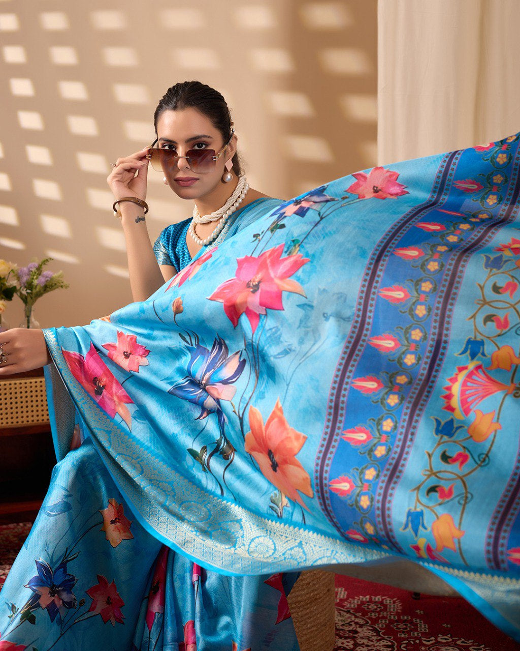 Womneline Sky Blue Floral Designer Saree with Elegant Woven Border & Artistic Pallu