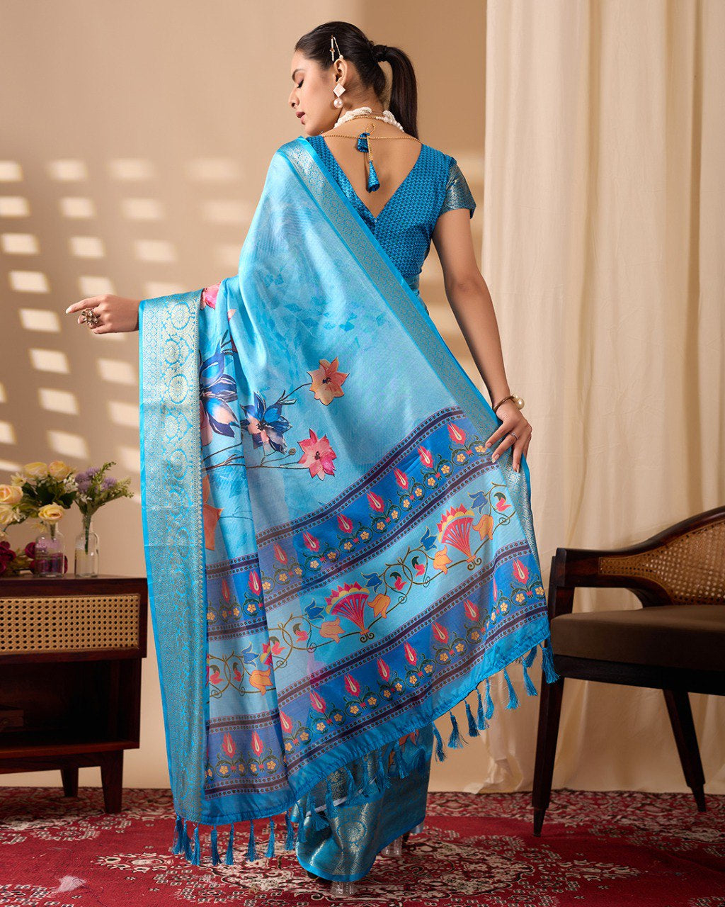 Womneline Sky Blue Floral Designer Saree with Elegant Woven Border & Artistic Pallu
