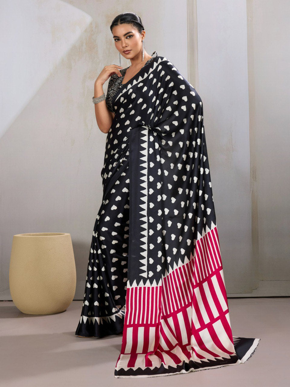 Womenline Black Heart Print Designer Saree with Pink Geometric Statement Pallu