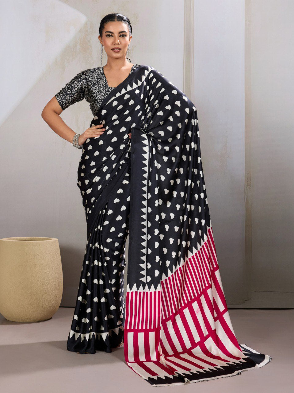 Womenline Black Heart Print Designer Saree with Pink Geometric Statement Pallu