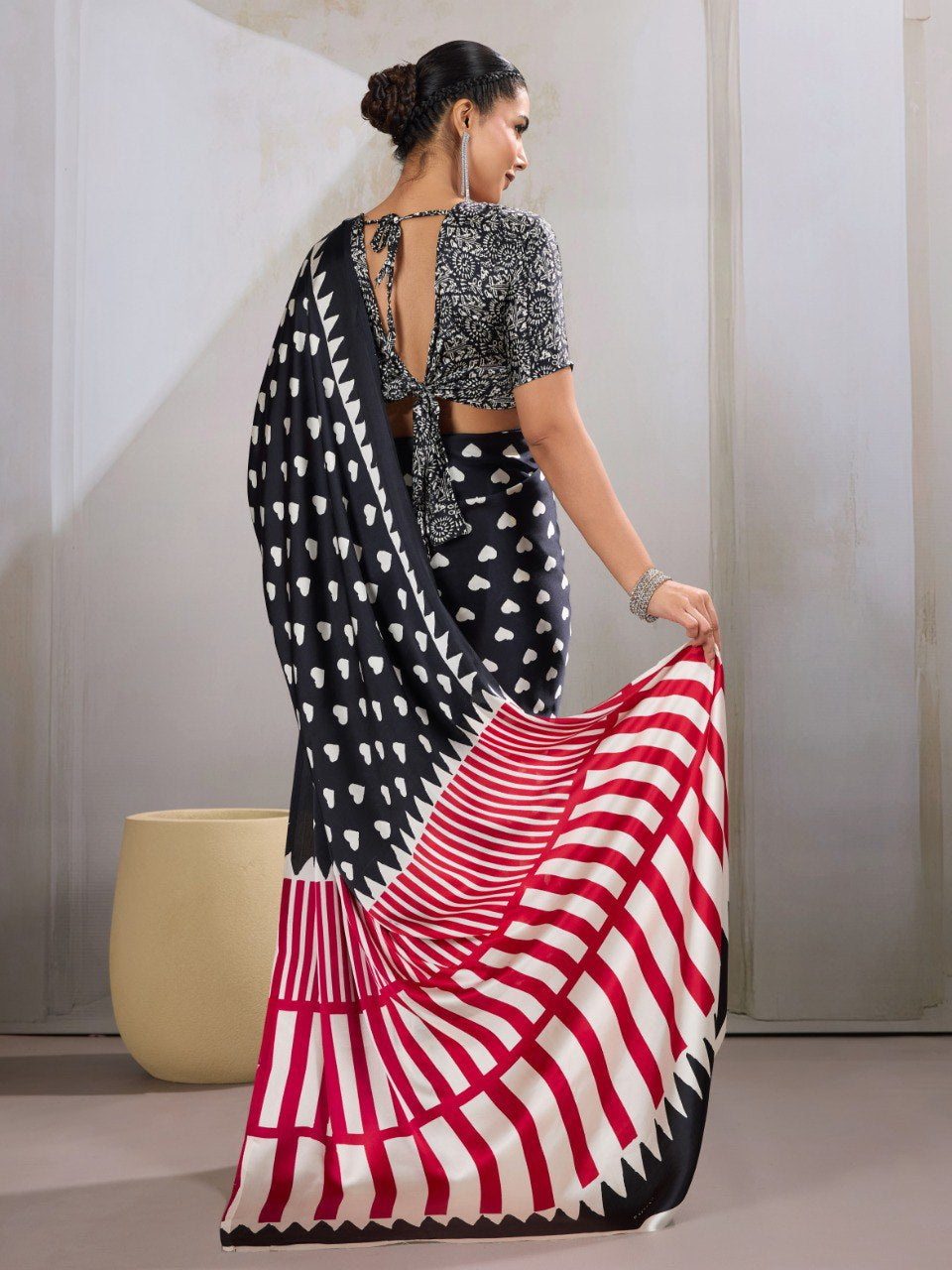 Womenline Black Heart Print Designer Saree with Pink Geometric Statement Pallu