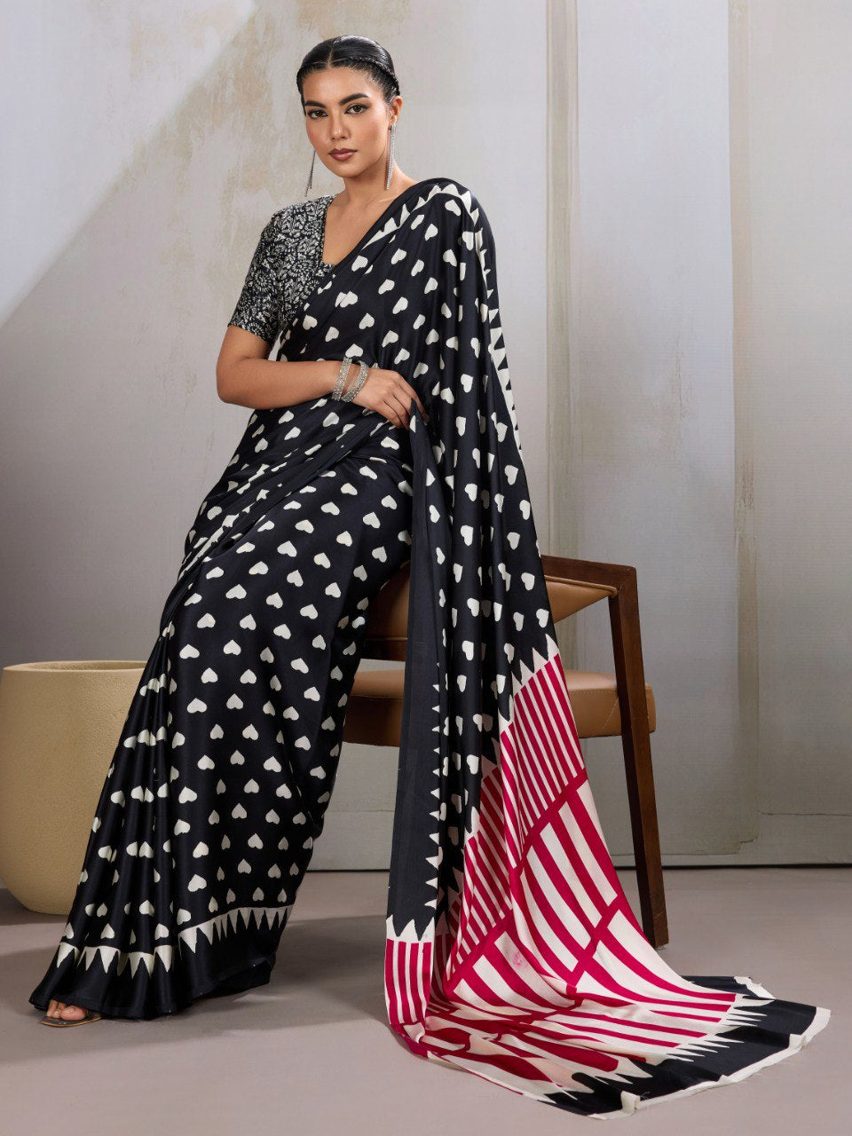 Womenline Black Heart Print Designer Saree with Pink Geometric Statement Pallu