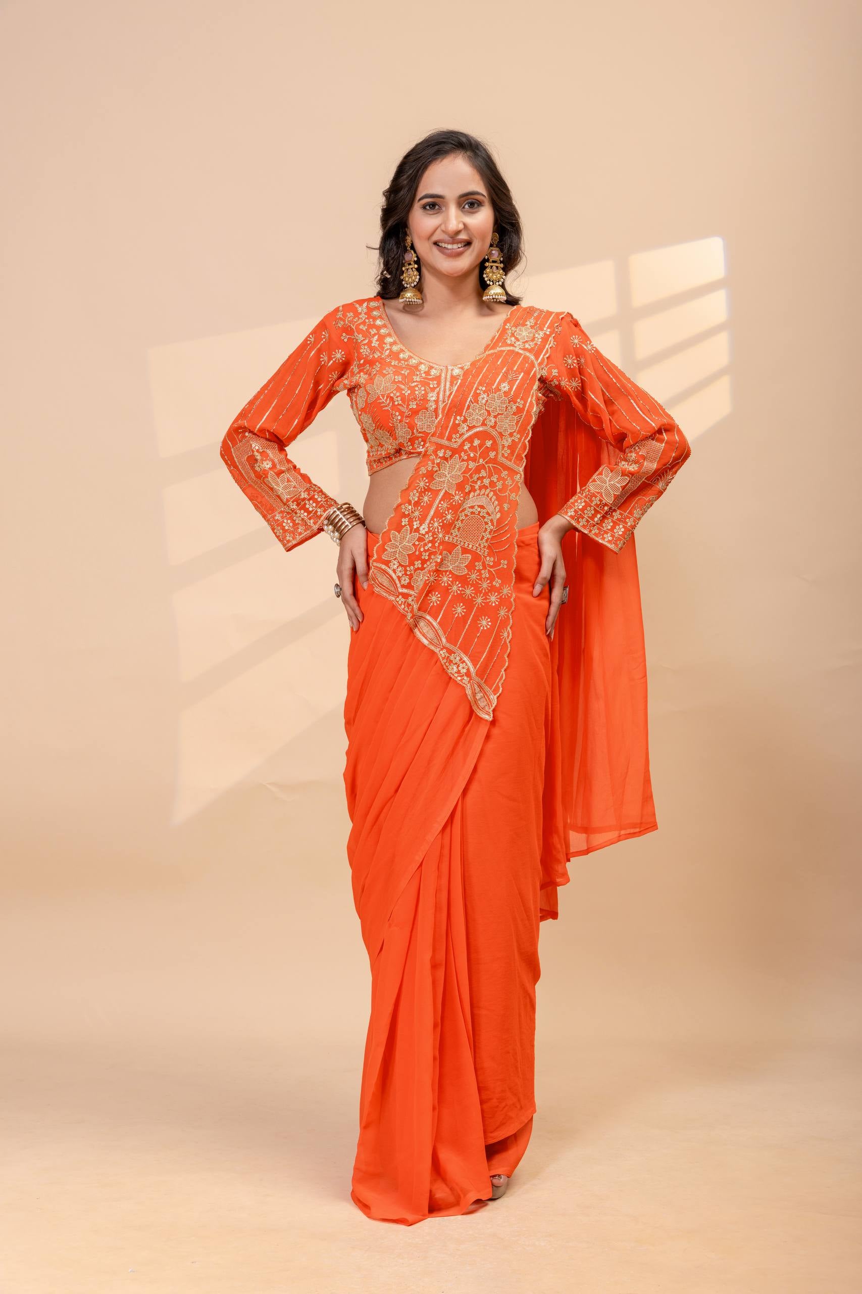 Womenline Sunset Orange Pre-Draped Saree Set with Intricate Gold Embroidered Blouse