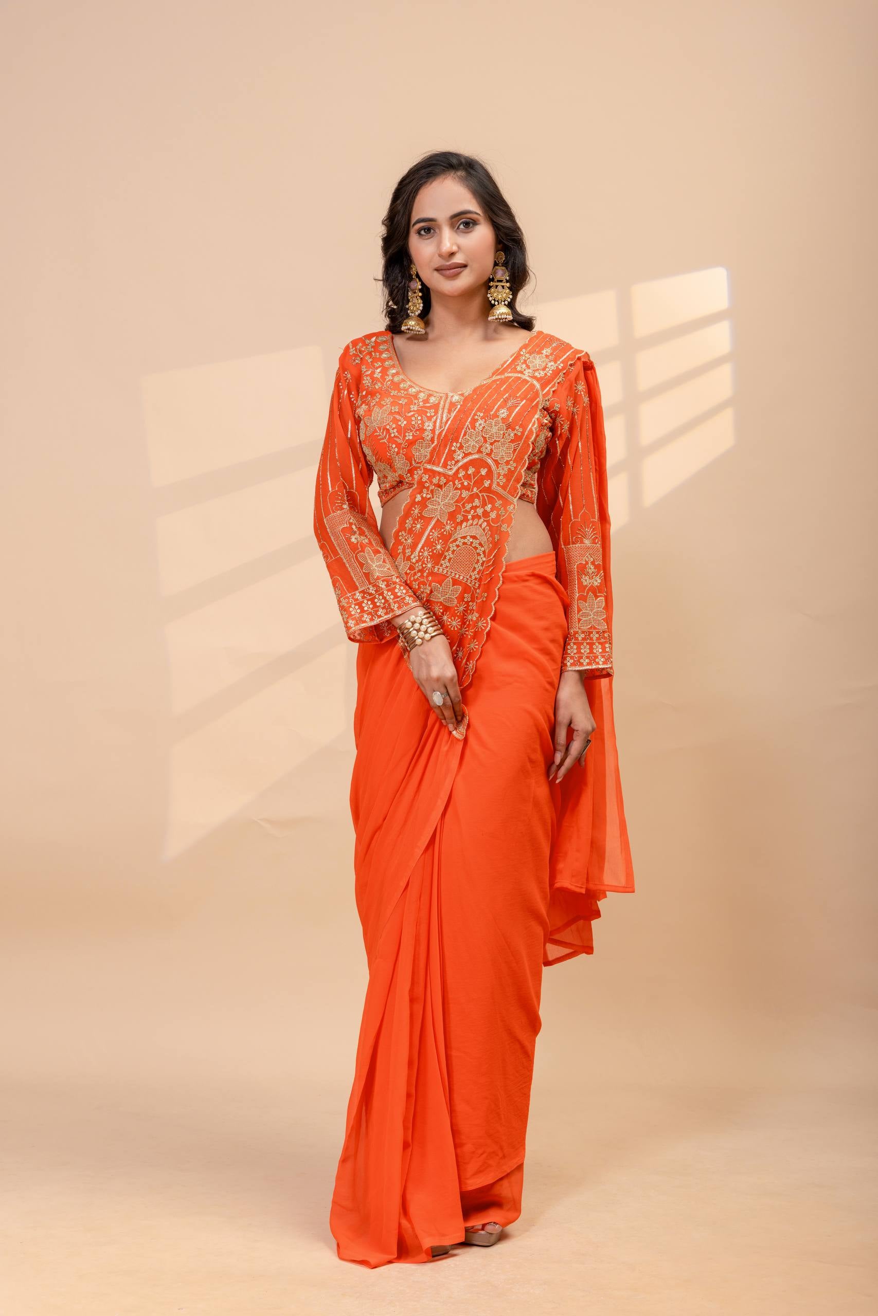 Womenline Sunset Orange Pre-Draped Saree Set with Intricate Gold Embroidered Blouse