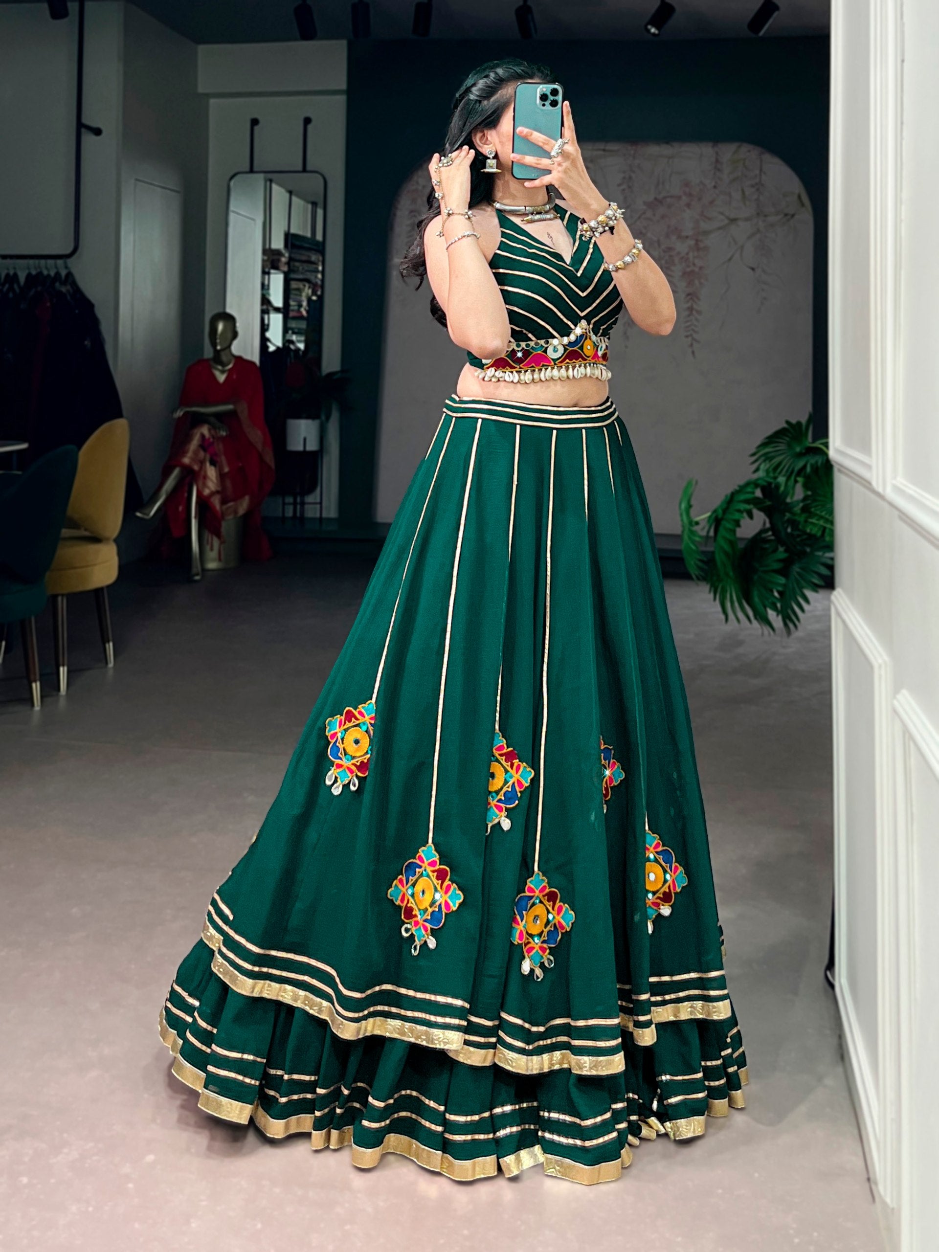 Womenline Emerald Green Mirror Work Festive Lehenga Set