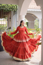 Womenline Rust Orange Tiered Navratri Lehenga Choli with Golden Border