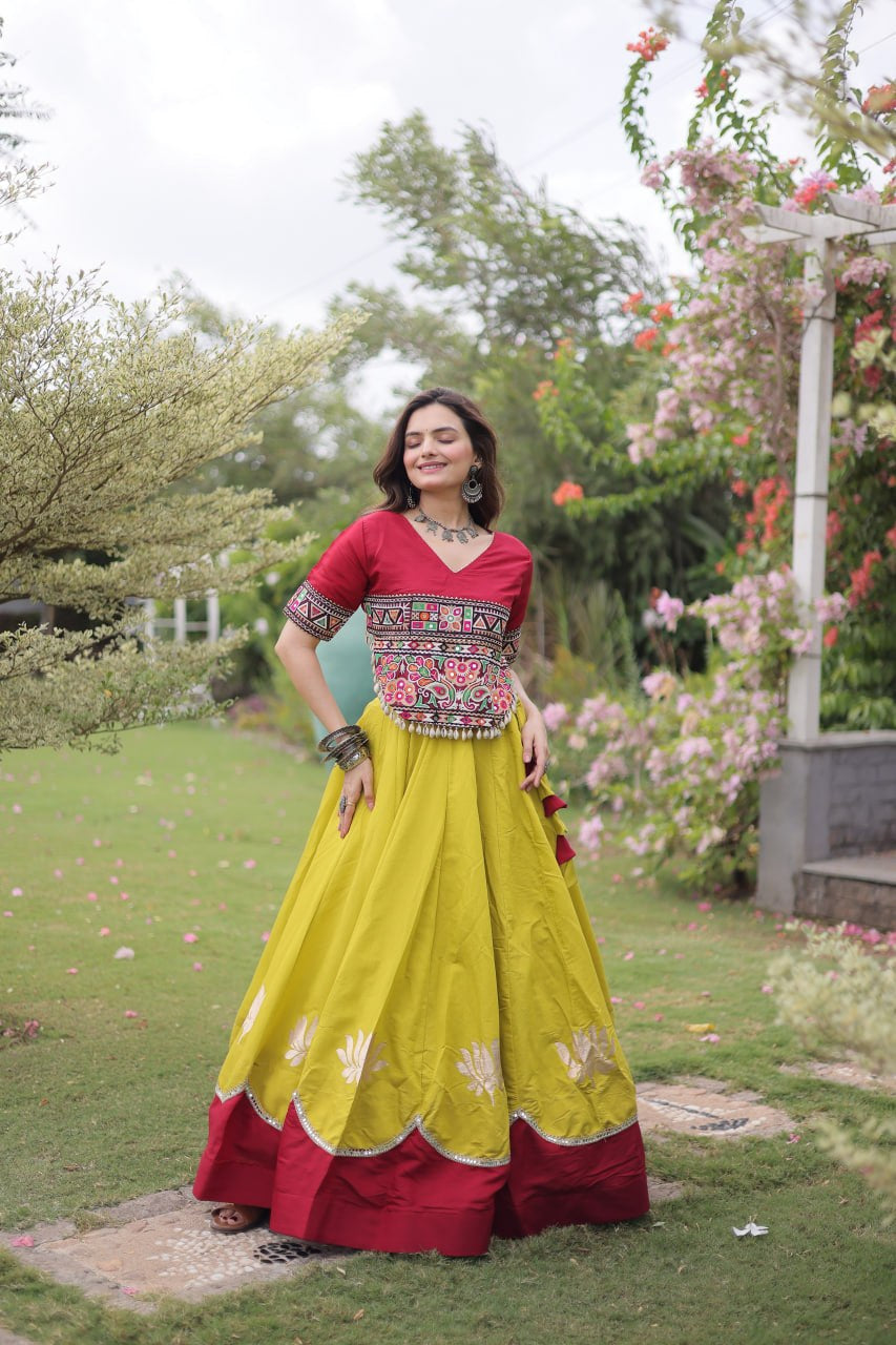 Womenline Maroon Kutchi Embroidered Choli with Lime Green Designer Navratri Lehenga