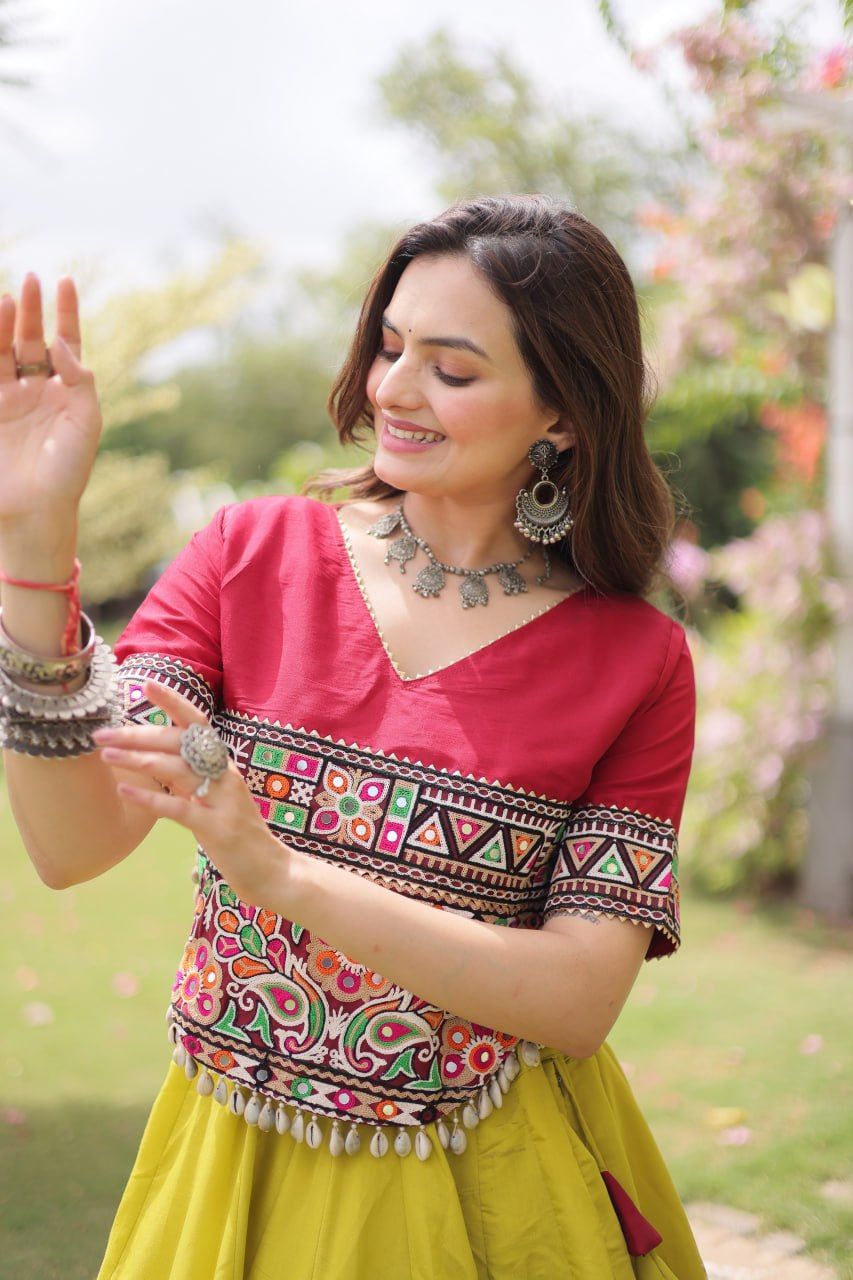 Womenline Maroon Kutchi Embroidered Choli with Lime Green Designer Navratri Lehenga