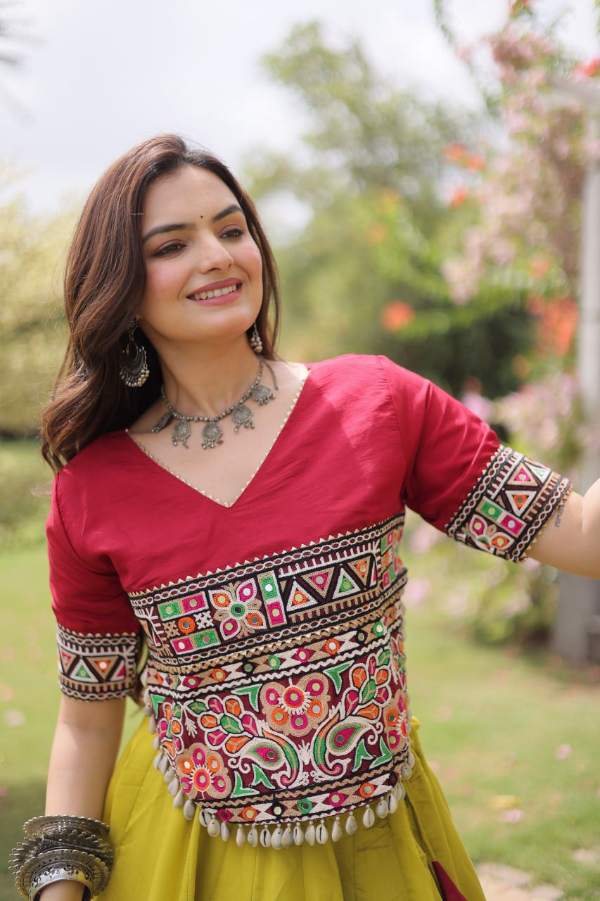 Womenline Maroon Kutchi Embroidered Choli with Lime Green Designer Navratri Lehenga