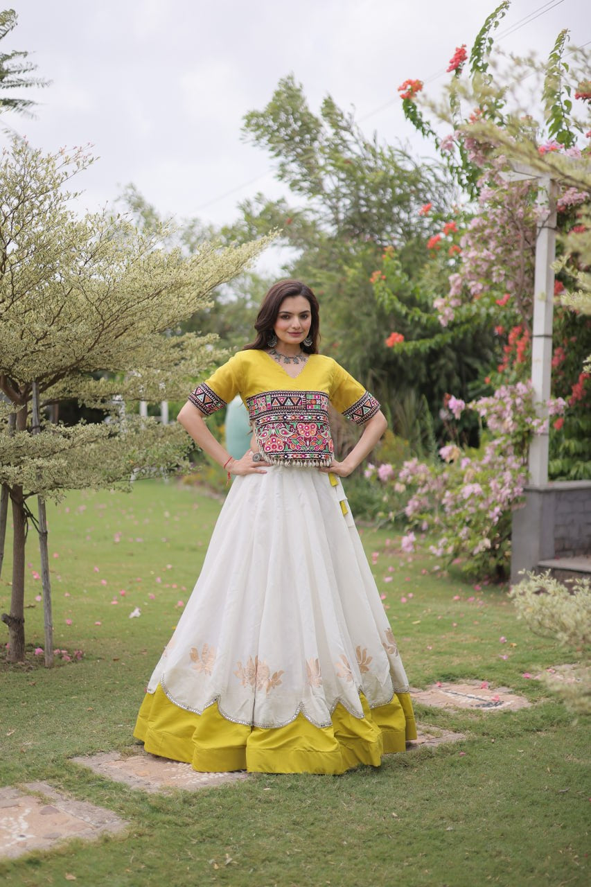 Womenline Yellow Kutchi Embroidered Choli with White Designer Navratri Lehenga