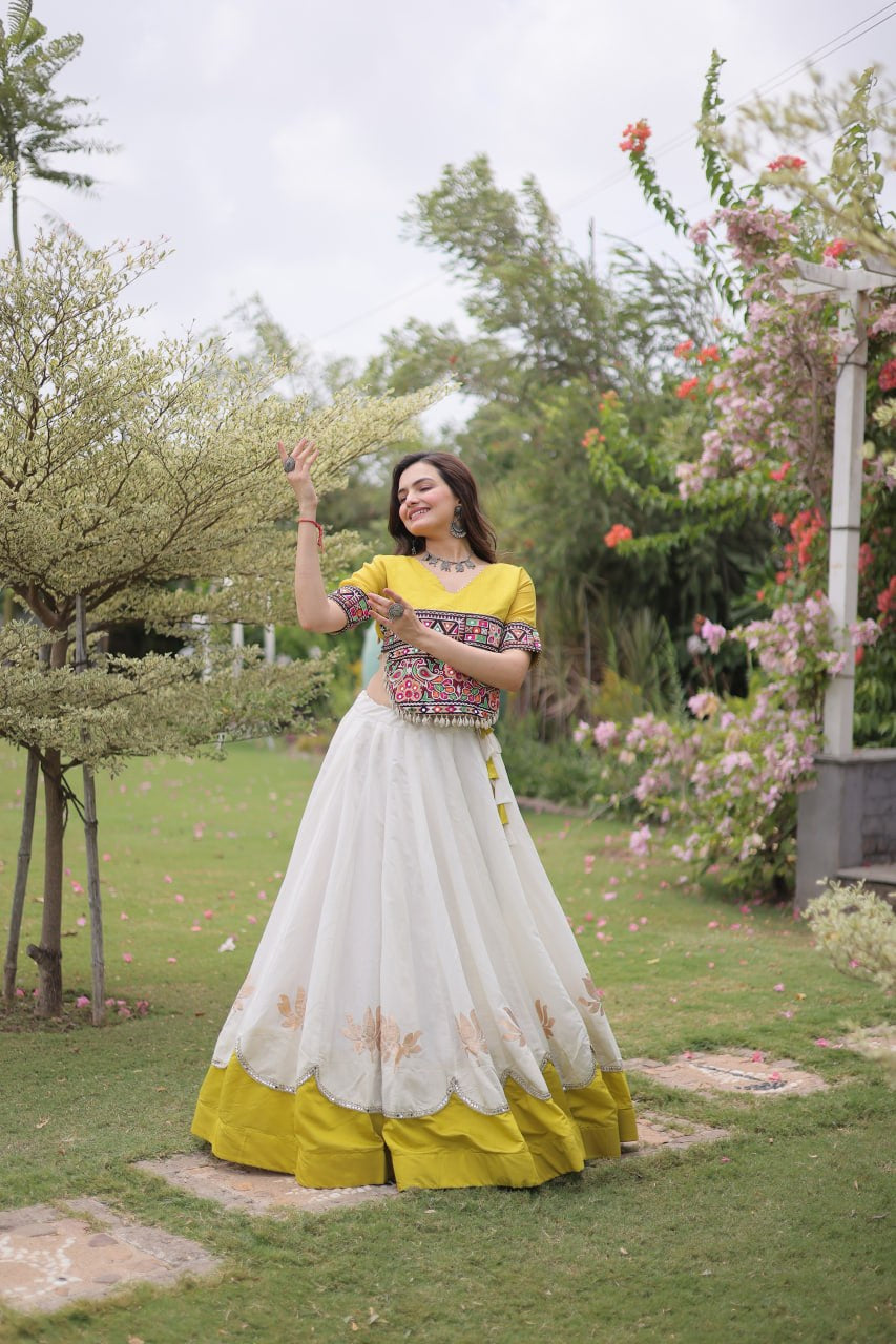 Womenline Yellow Kutchi Embroidered Choli with White Designer Navratri Lehenga