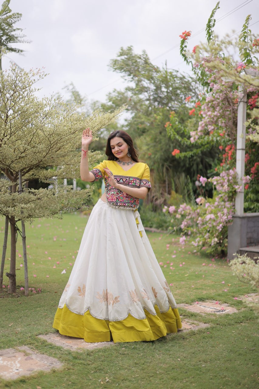 Womenline Yellow Kutchi Embroidered Choli with White Designer Navratri Lehenga