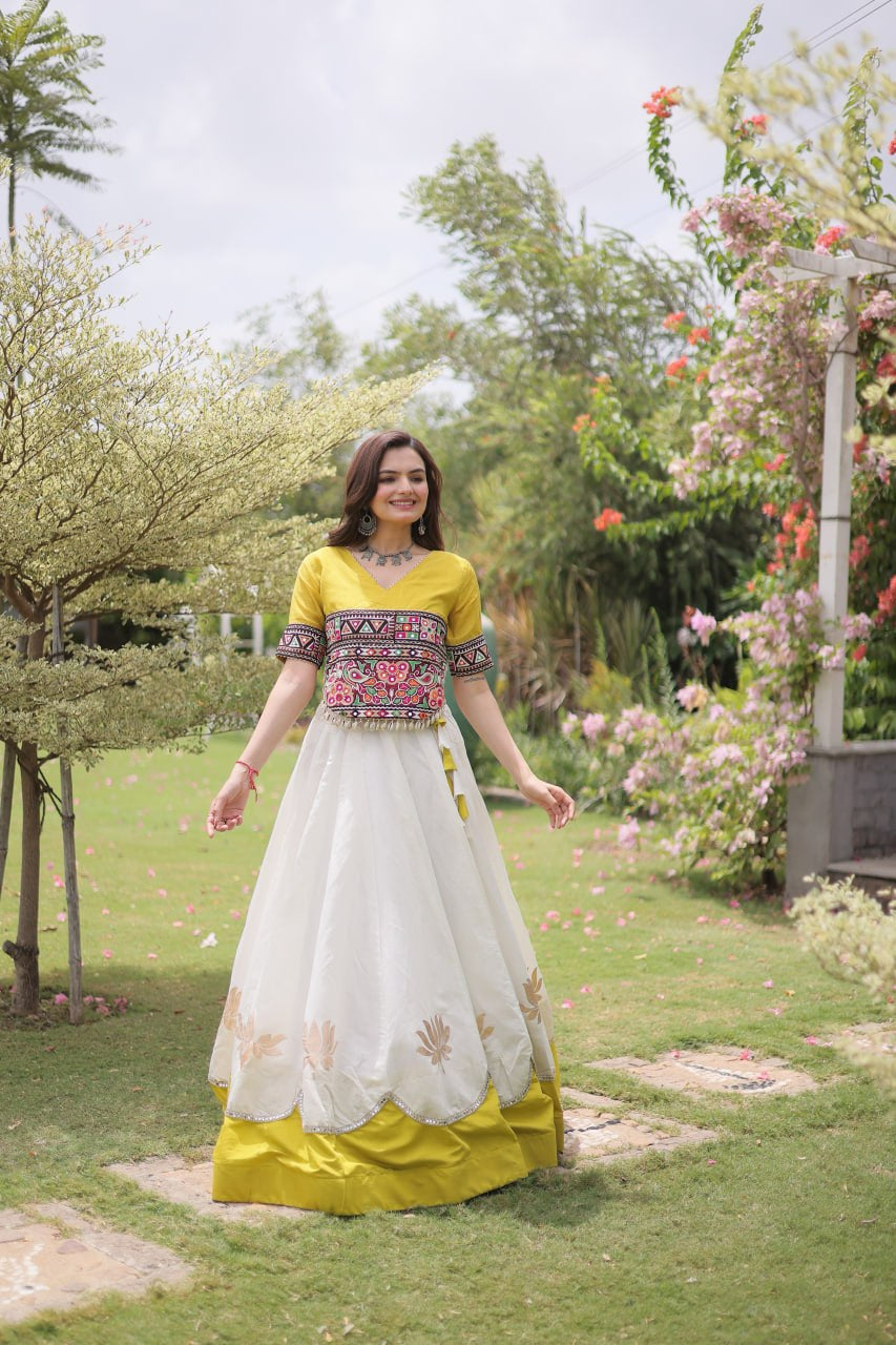 Womenline Yellow Kutchi Embroidered Choli with White Designer Navratri Lehenga