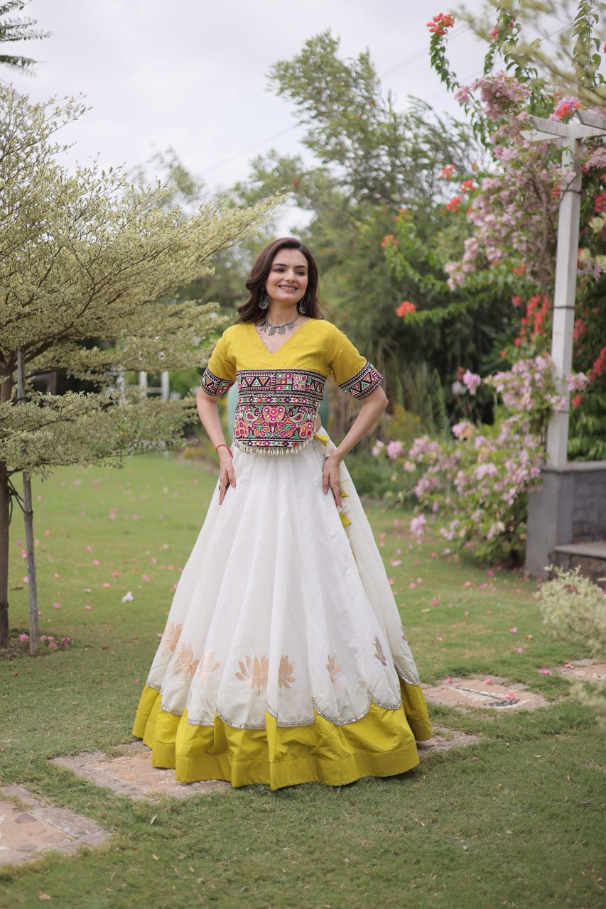 Womenline Yellow Kutchi Embroidered Choli with White Designer Navratri Lehenga
