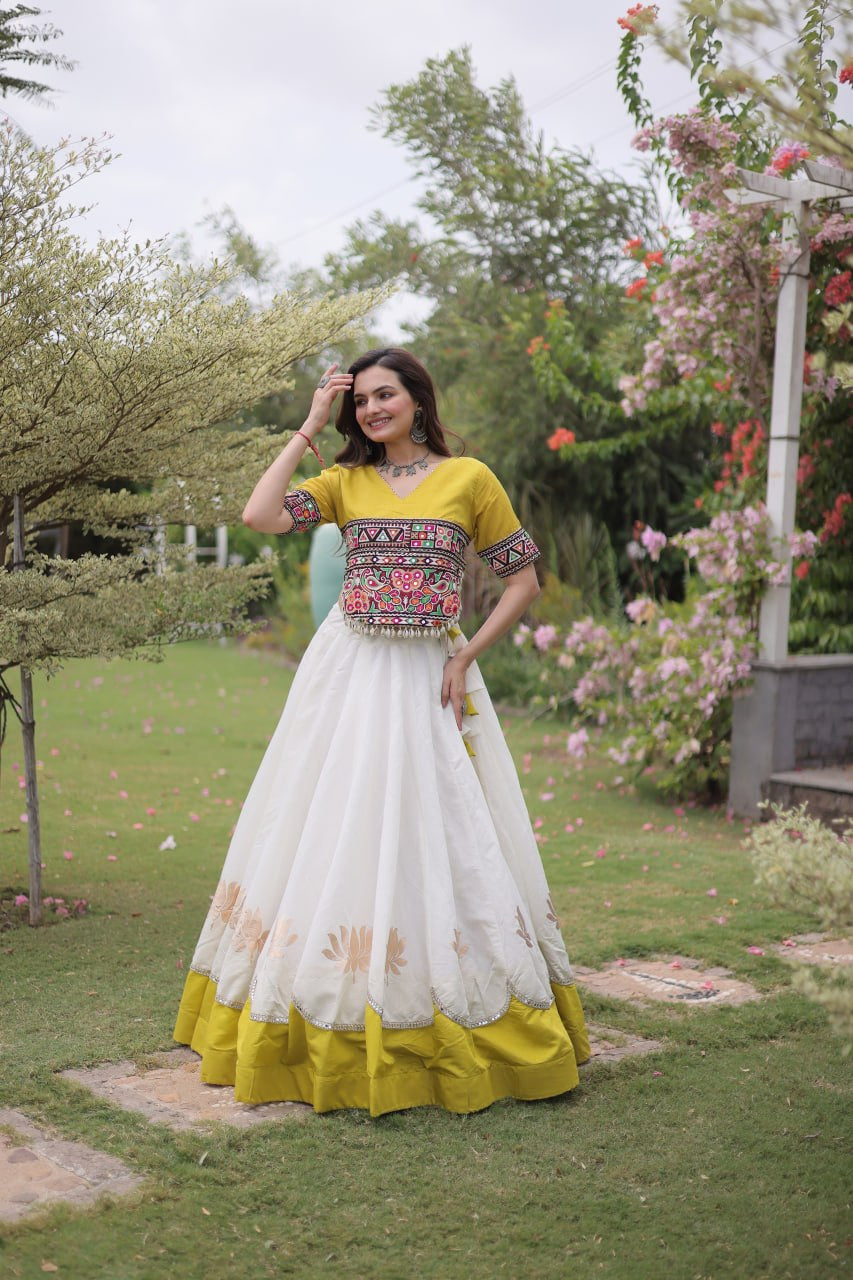 Womenline Yellow Kutchi Embroidered Choli with White Designer Navratri Lehenga