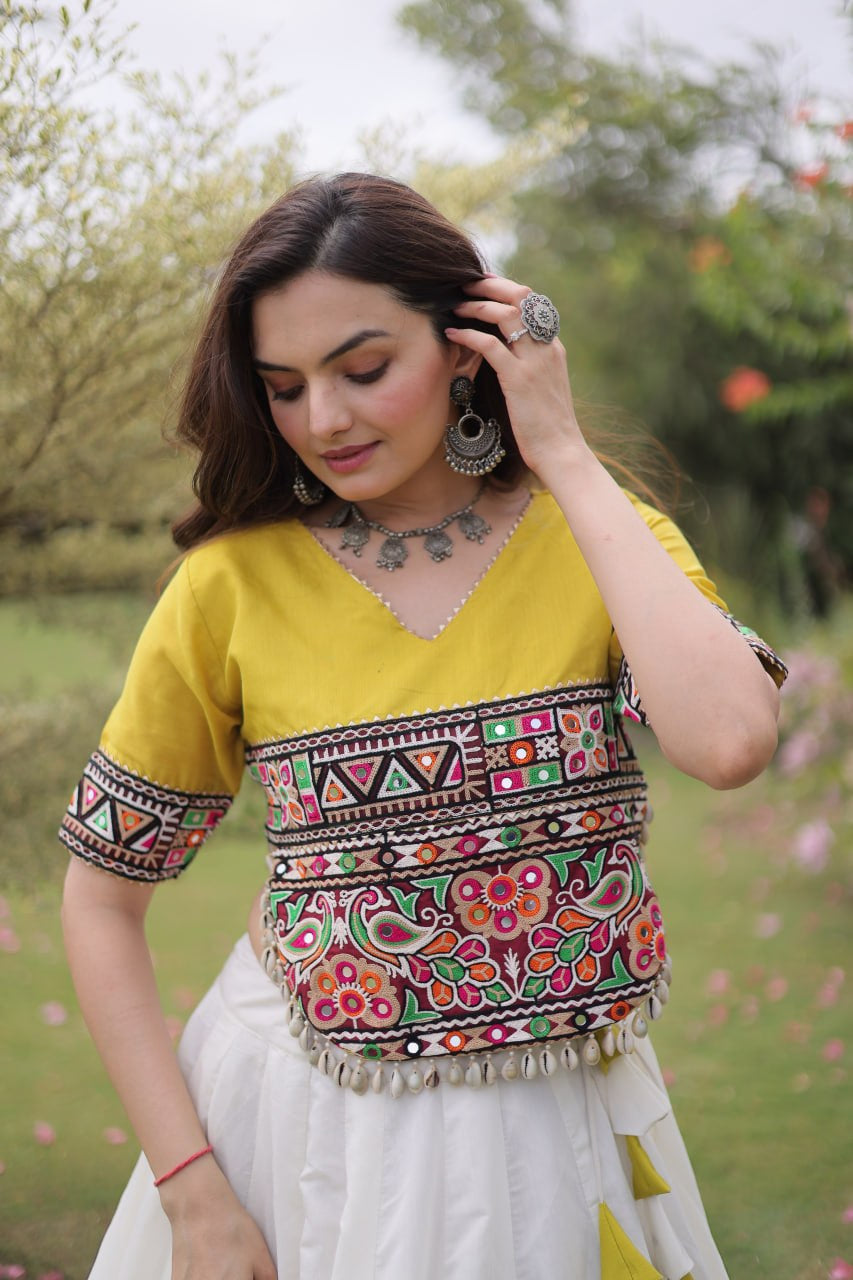 Womenline Yellow Kutchi Embroidered Choli with White Designer Navratri Lehenga