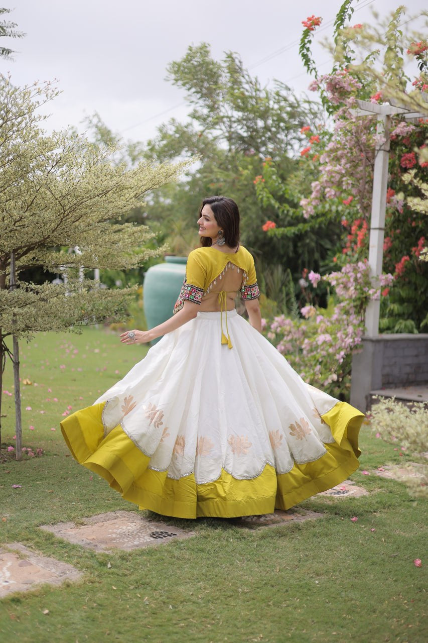 Womenline Yellow Kutchi Embroidered Choli with White Designer Navratri Lehenga