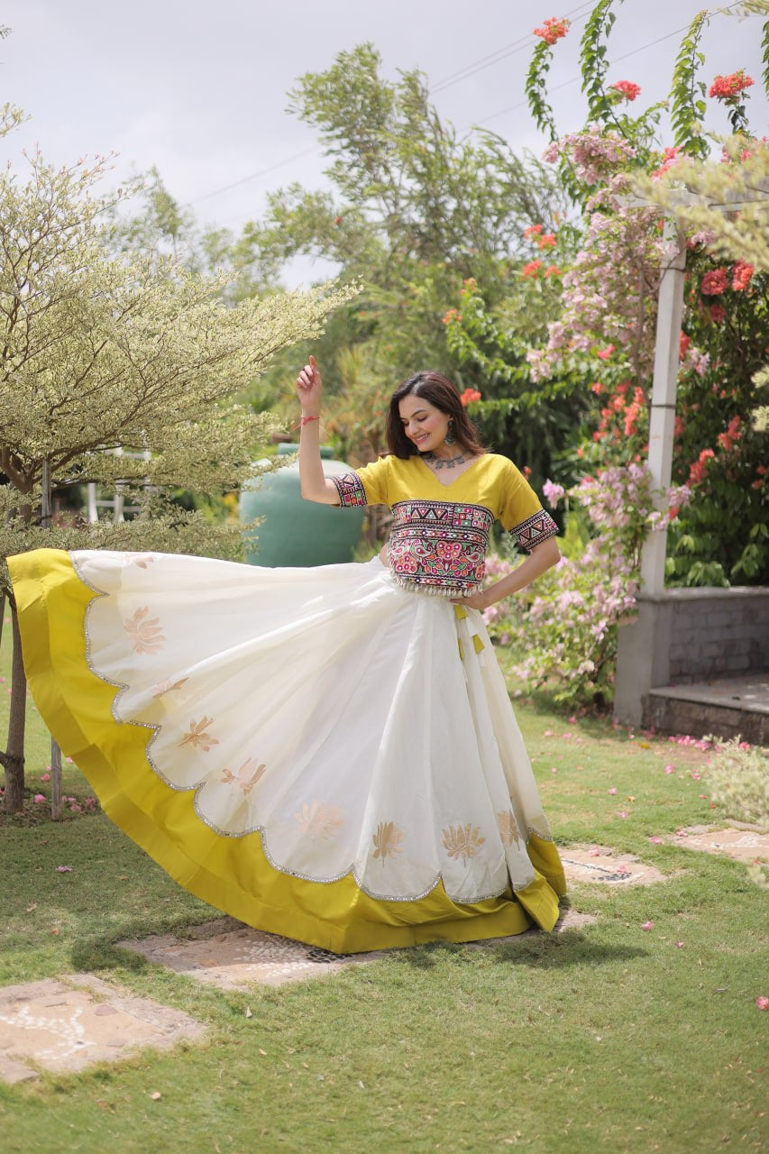 Womenline Yellow Kutchi Embroidered Choli with White Designer Navratri Lehenga