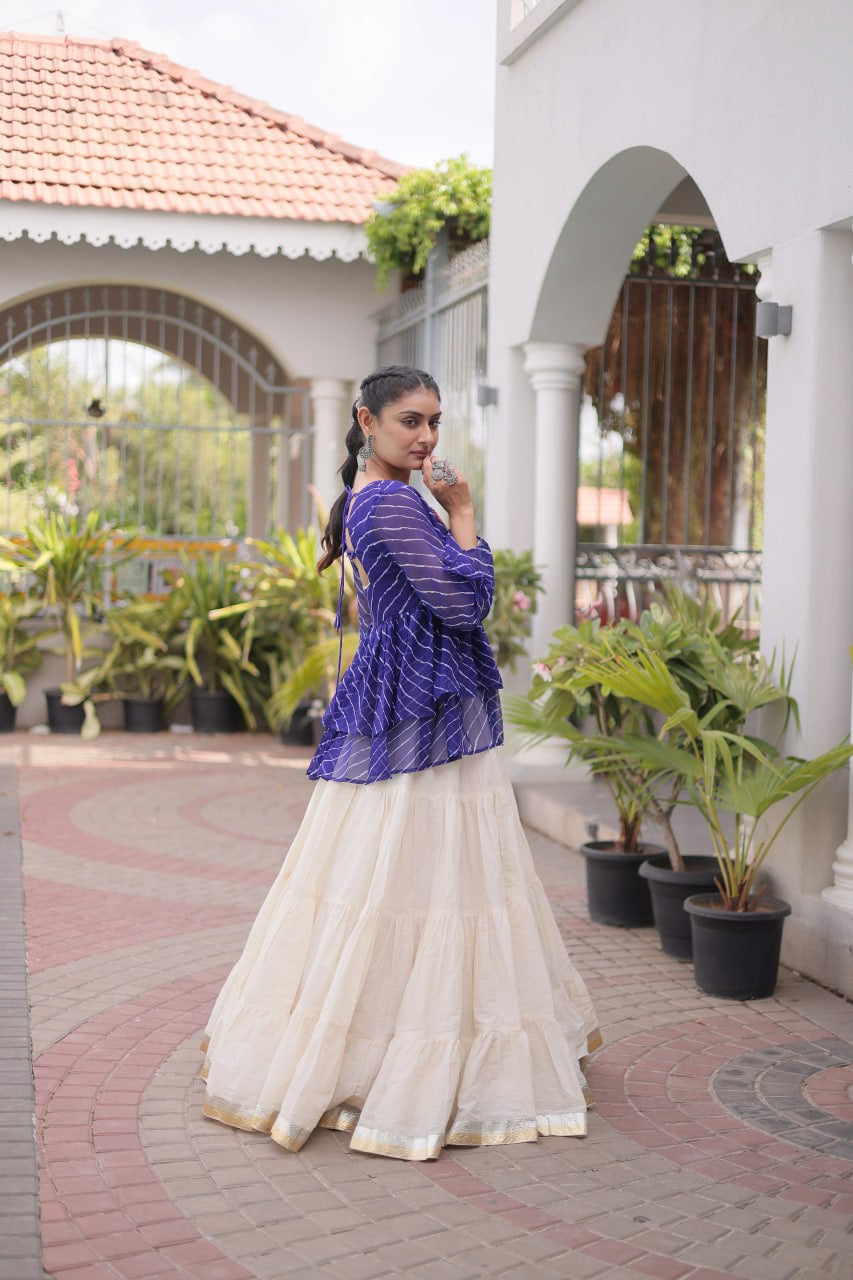 Womenline Royal Blue Kutchi Embroidered Peplum Top with White Tiered Navratri Lehenga