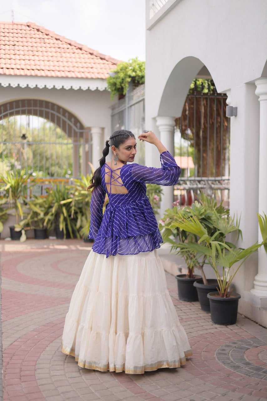 Womenline Royal Blue Kutchi Embroidered Peplum Top with White Tiered Navratri Lehenga