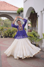 Womenline Royal Blue Kutchi Embroidered Peplum Top with White Tiered Navratri Lehenga