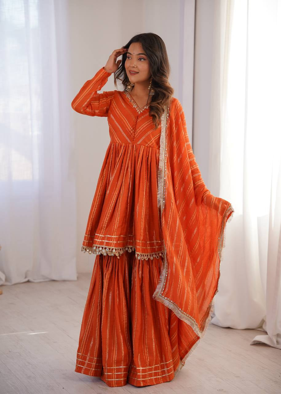 Womenline Burnt Orange Stripe Peplum Sharara Suit Set with Lurex Dupatta