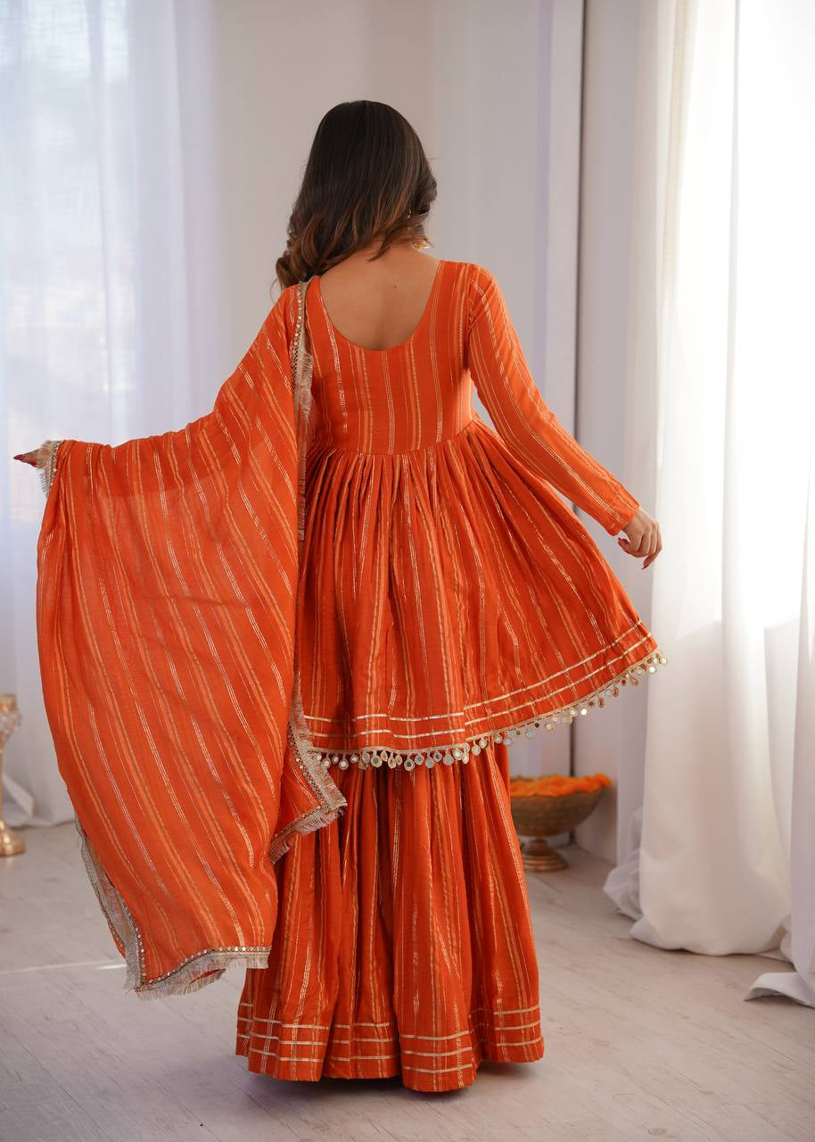 Womenline Burnt Orange Stripe Peplum Sharara Suit Set with Lurex Dupatta
