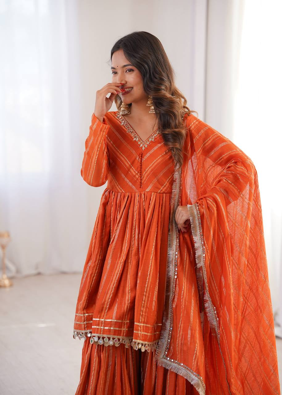 Womenline Burnt Orange Stripe Peplum Sharara Suit Set with Lurex Dupatta