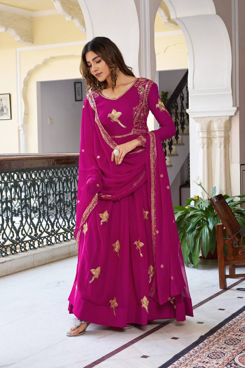 Womenline Elegant Rani Pink Anarkali Gown Set with Golden Bird Motif Embroidery & Dupatta