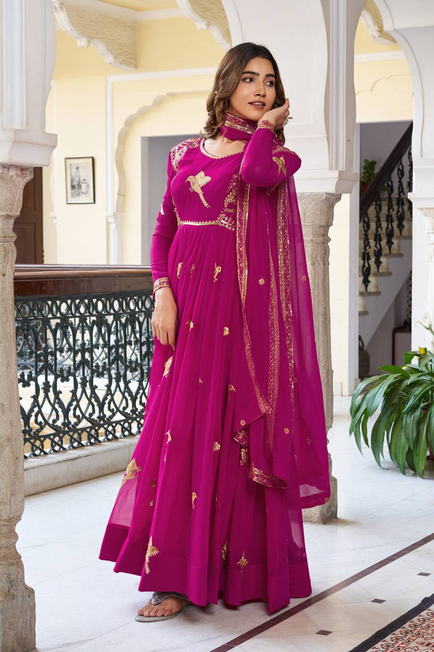 Womenline Elegant Rani Pink Anarkali Gown Set with Golden Bird Motif Embroidery & Dupatta