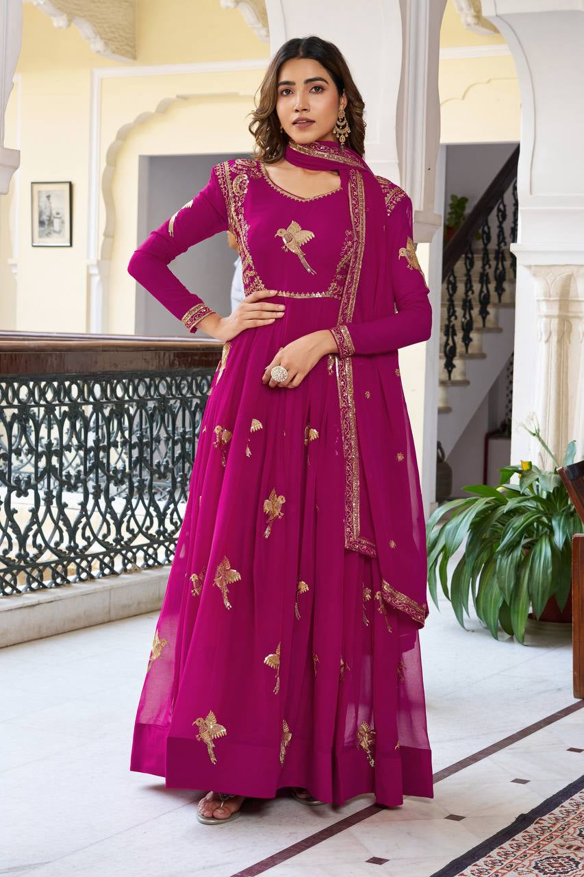 Womenline Elegant Rani Pink Anarkali Gown Set with Golden Bird Motif Embroidery & Dupatta