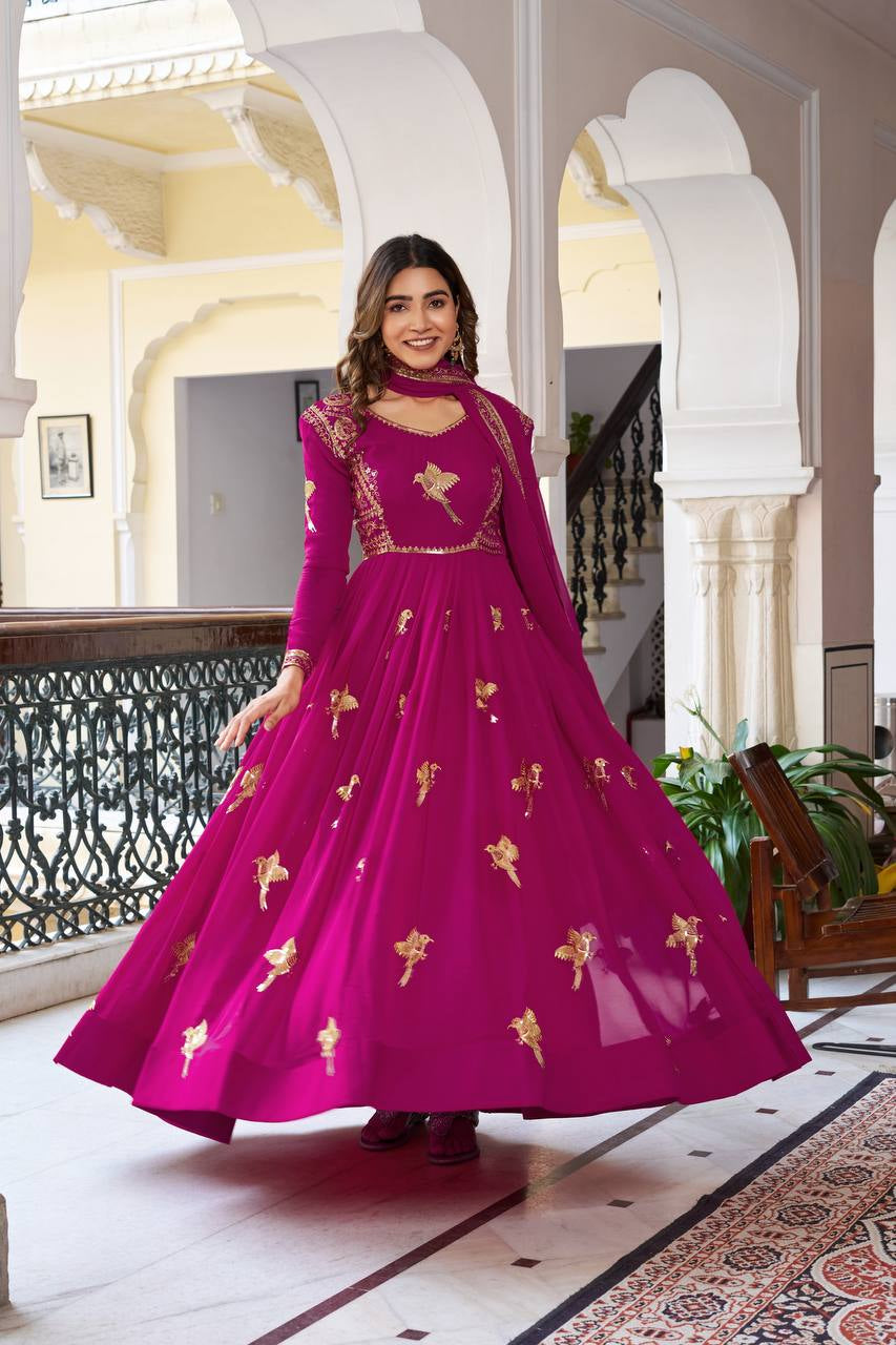 Womenline Elegant Rani Pink Anarkali Gown Set with Golden Bird Motif Embroidery & Dupatta