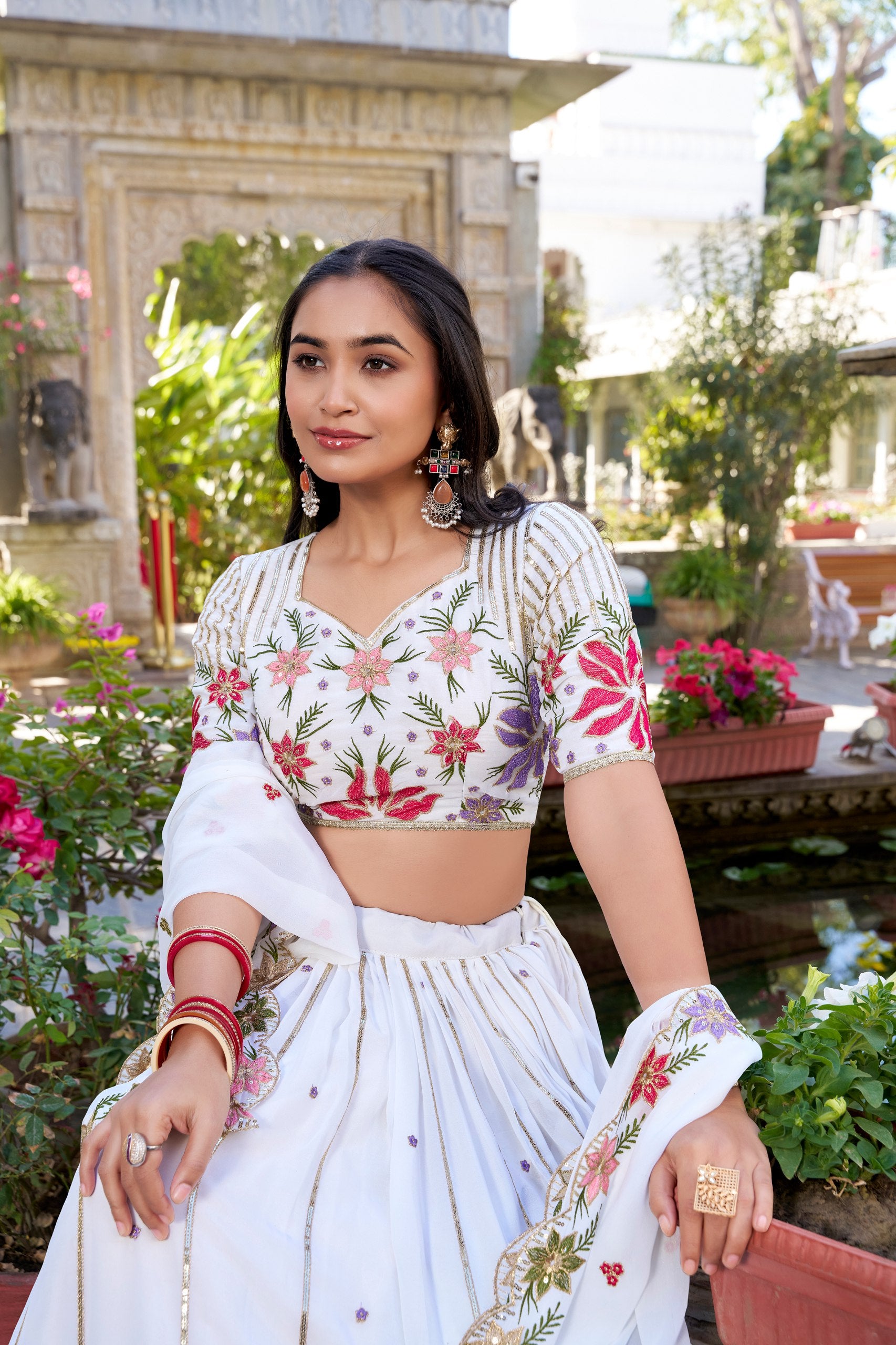 Womenline White Color Georgette Thread Embroidered Lehenga Choli