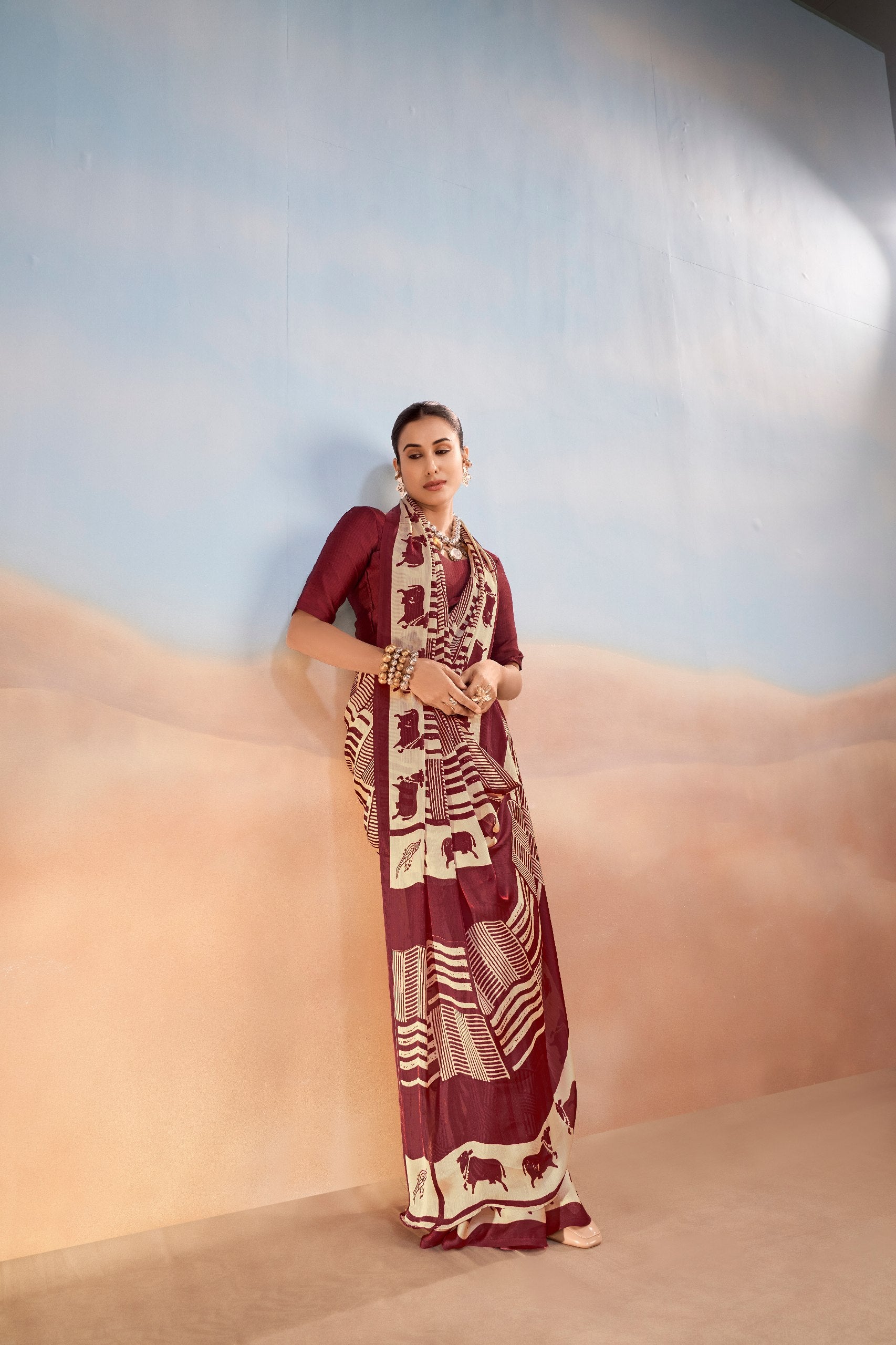 Womenline Maroon & Beige Printed Saree with Geometric & Animal Motif Design