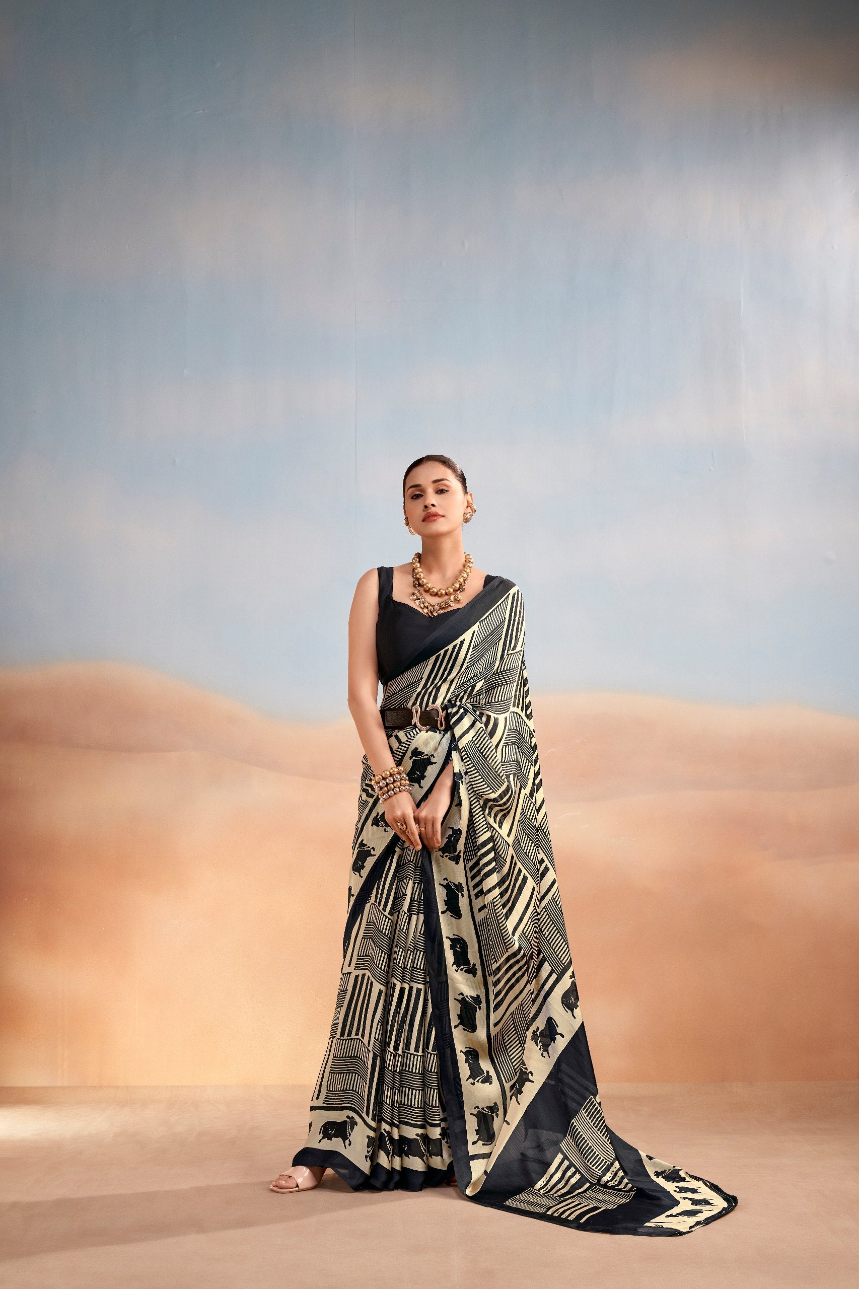 Womenline Black & Beige Printed Saree with Geometric & Animal Motif Design