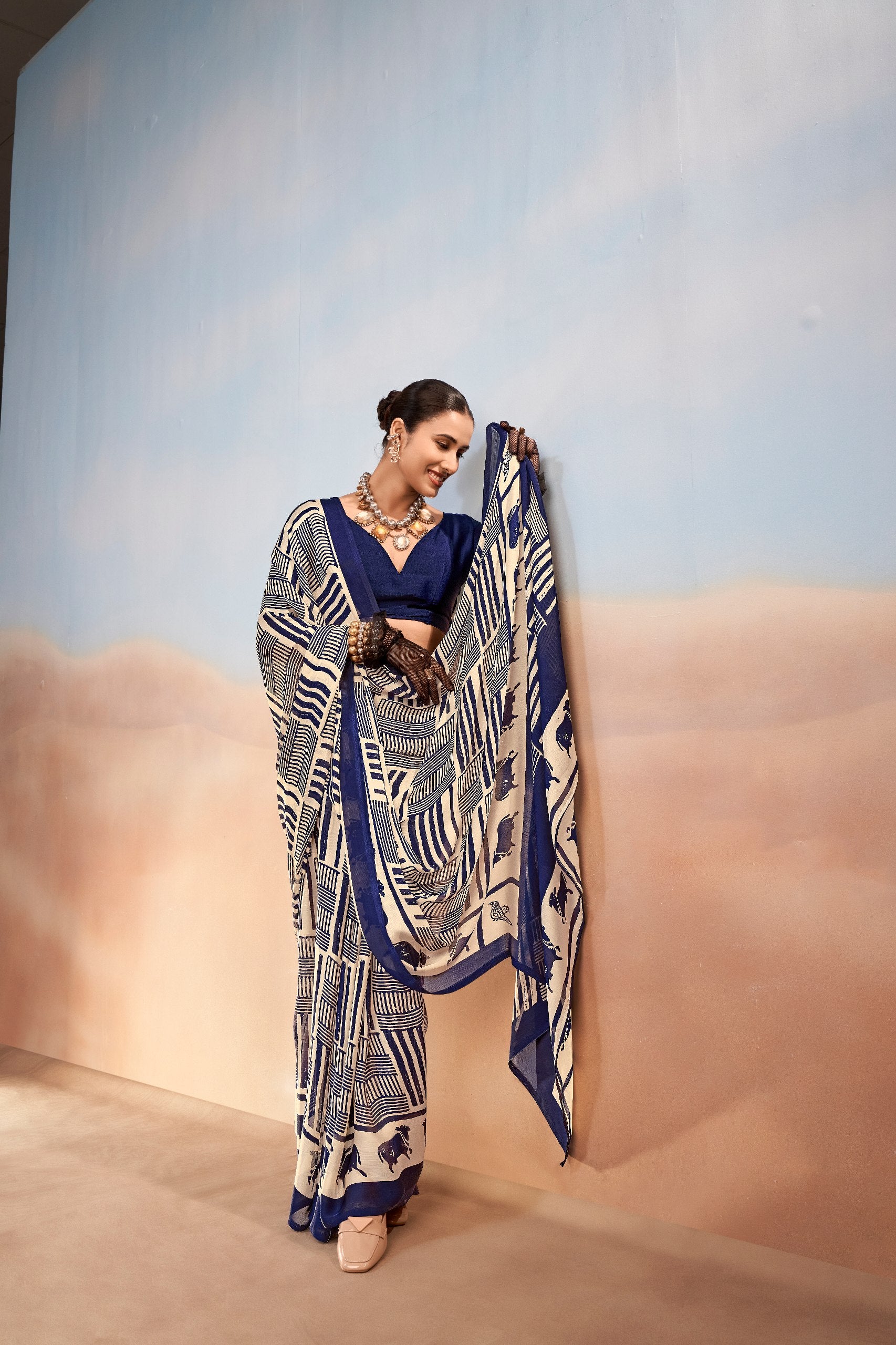 Womenline Royal Blue Printed Saree with Geometric & Animal Motif Design