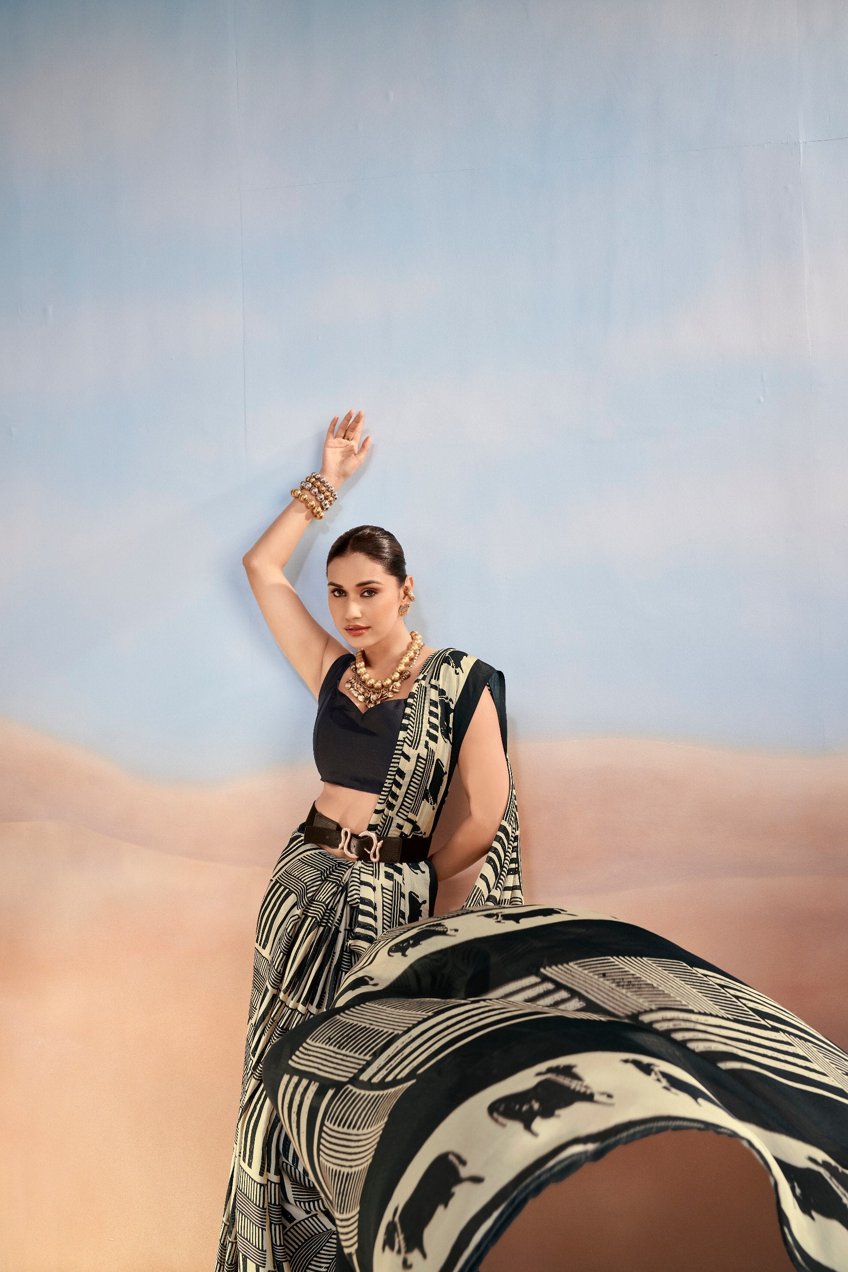 Womenline Black & Beige Printed Saree with Geometric & Animal Motif Design