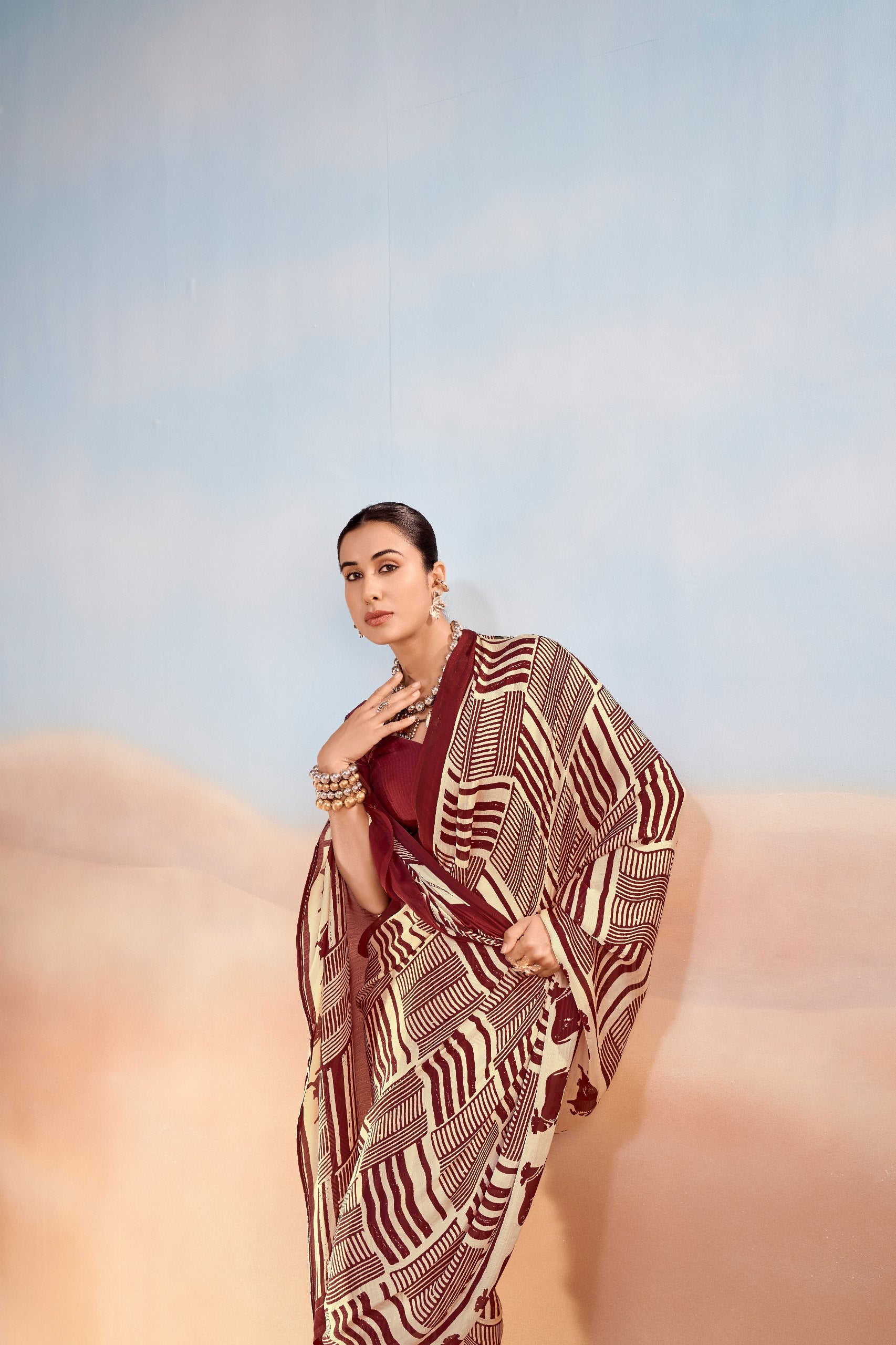 Womenline Maroon & Beige Printed Saree with Geometric & Animal Motif Design