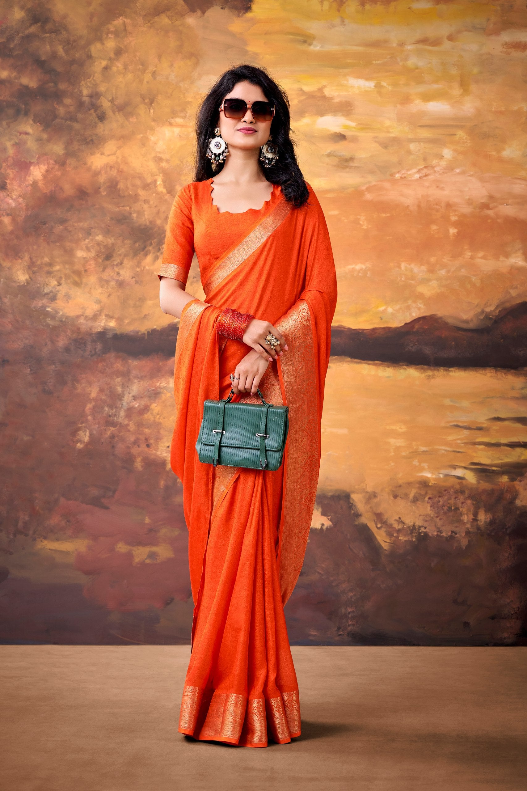 Womenline Orange Saree with Rich Gold Border
