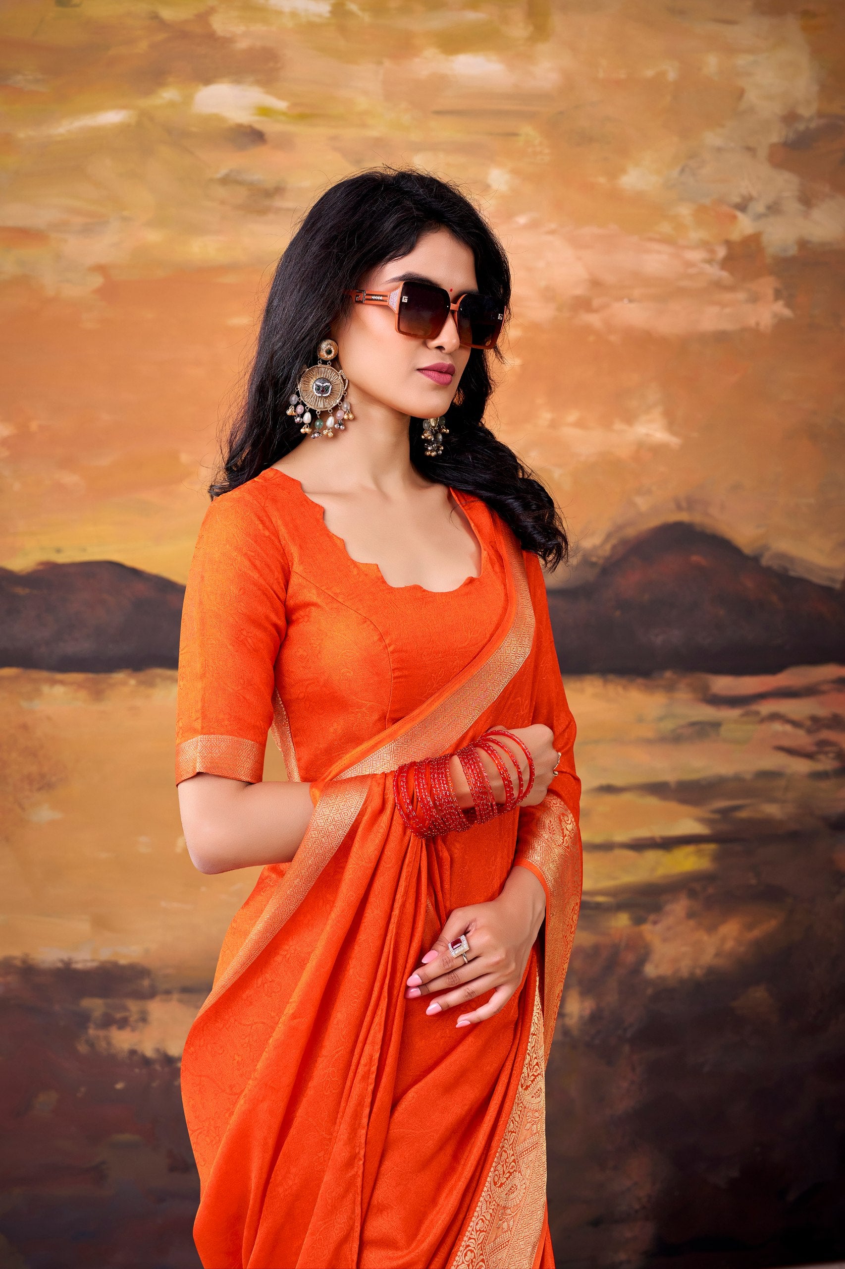 Womenline Orange Saree with Rich Gold Border