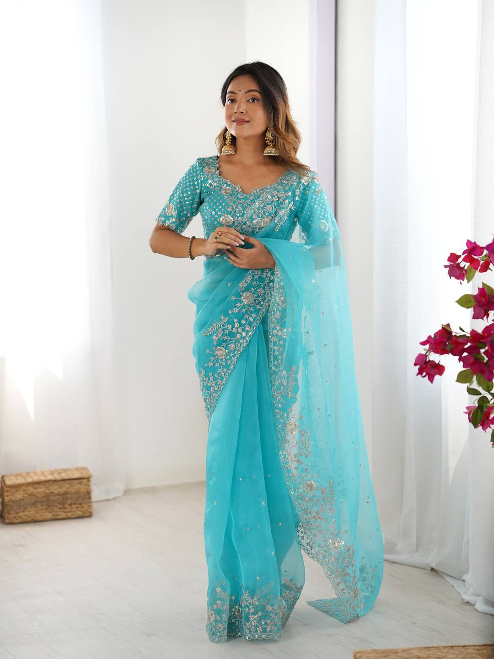 Womenline Elegant Aqua Blue Embroidered Saree Set