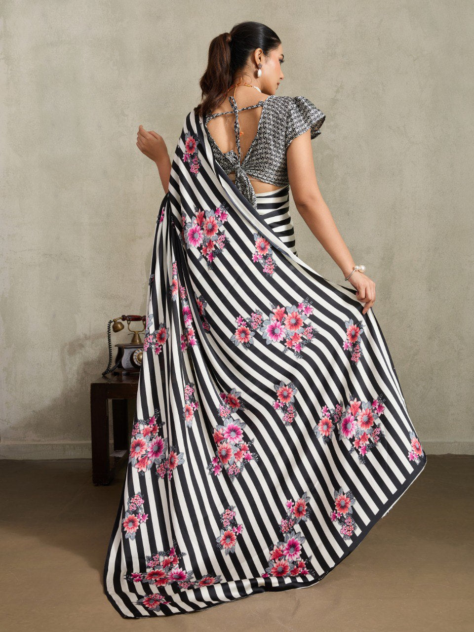 Womneline Black & White Floral Stripe Designer Saree with Elegant Blossom Print