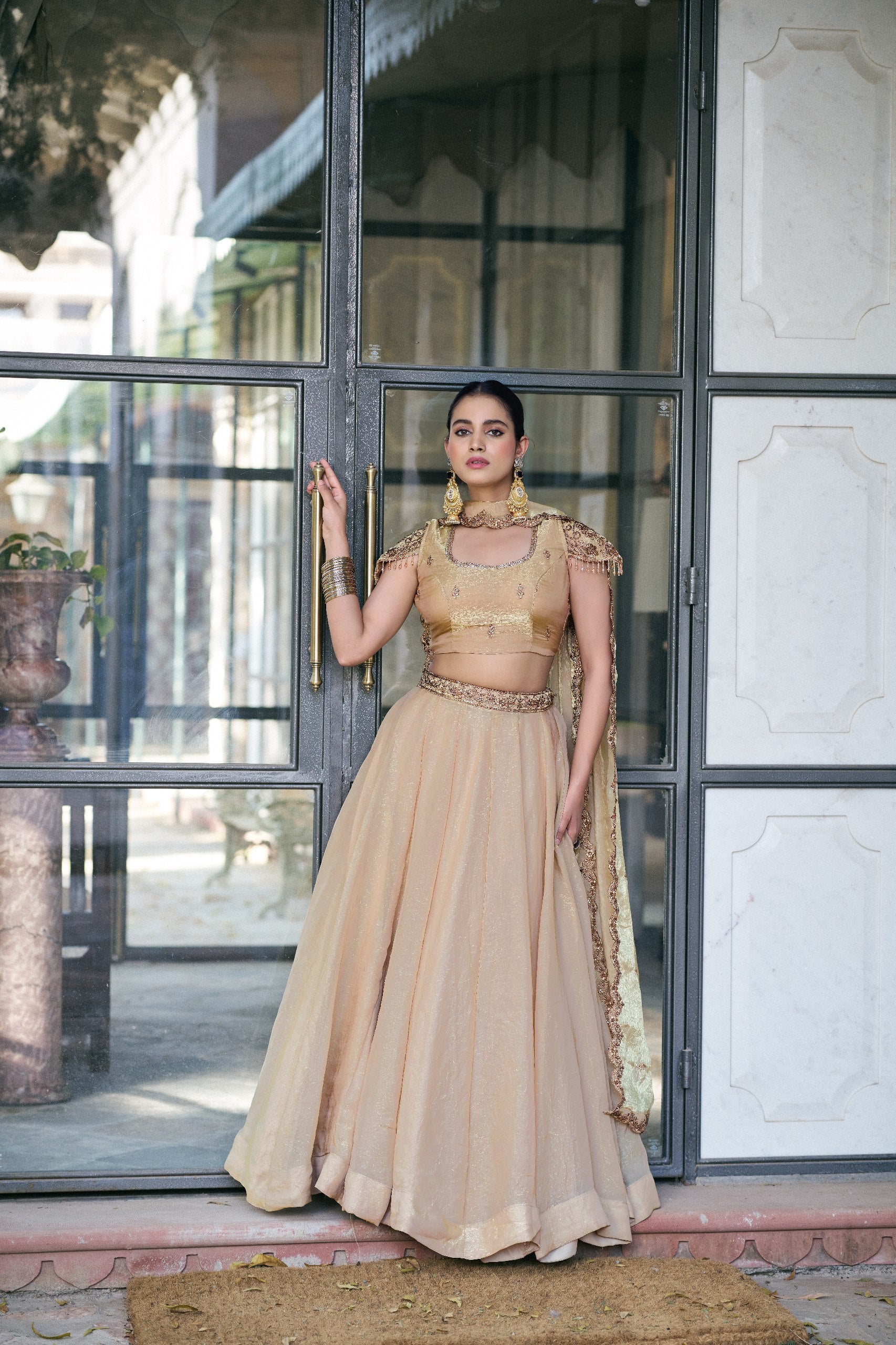 Womenline Champagne Gold Designer Lehenga Choli with Embellished Dupatta