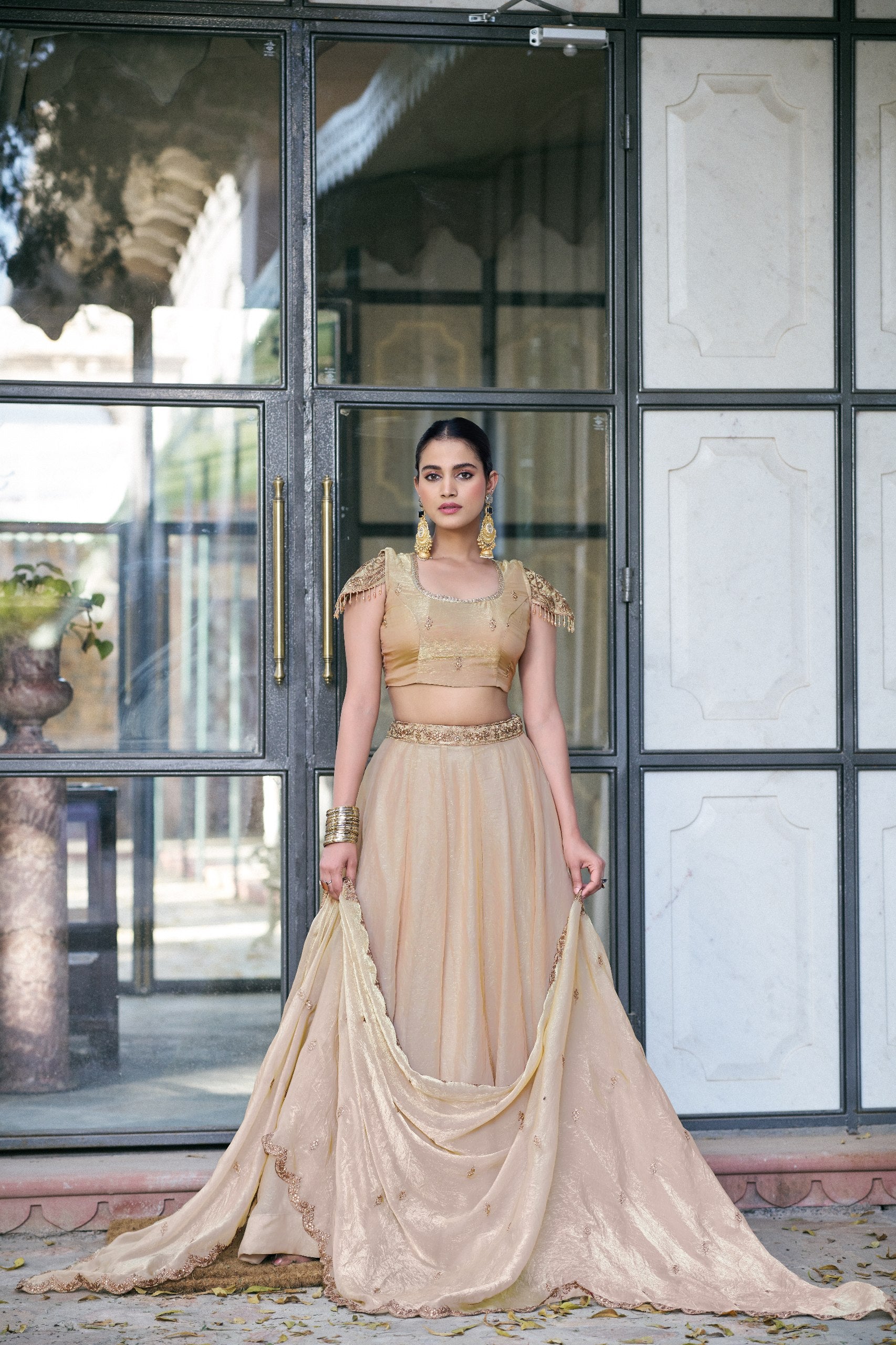 Womenline Champagne Gold Designer Lehenga Choli with Embellished Dupatta