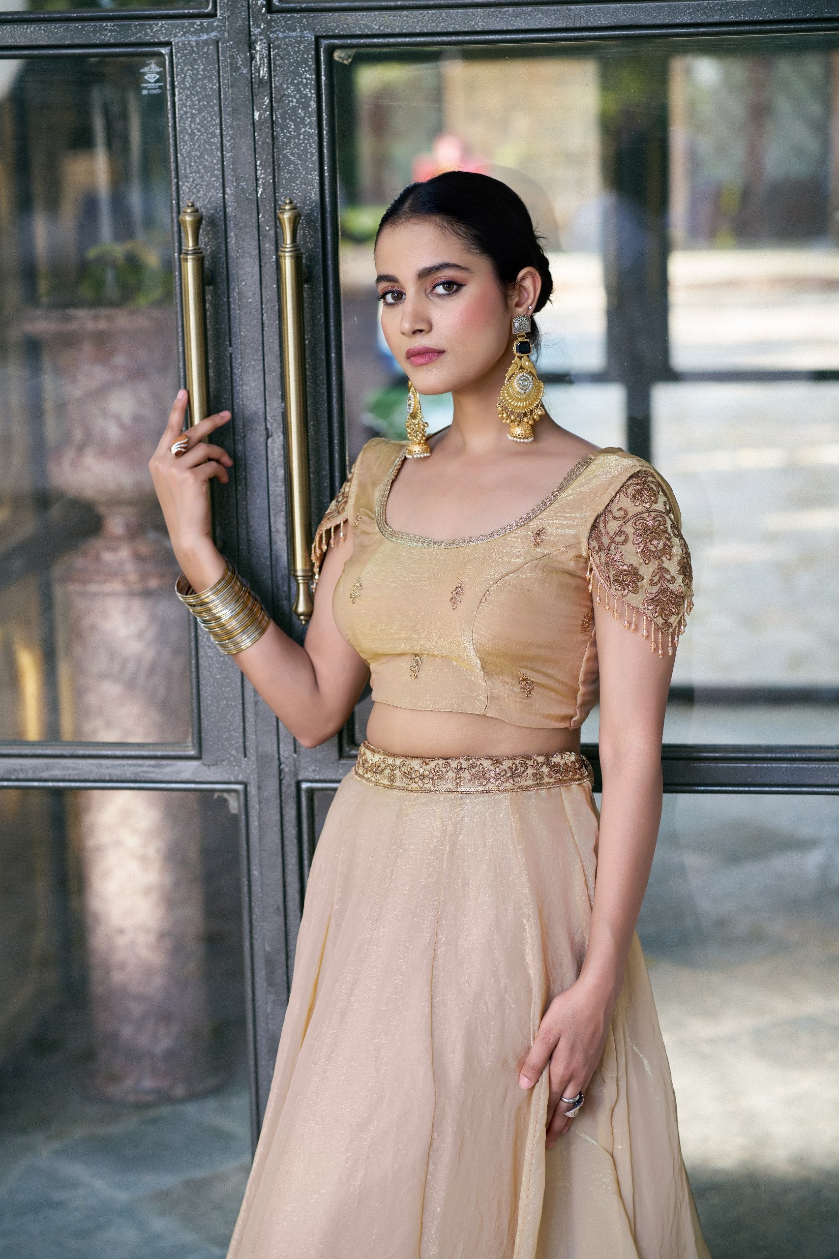 Womenline Champagne Gold Designer Lehenga Choli with Embellished Dupatta