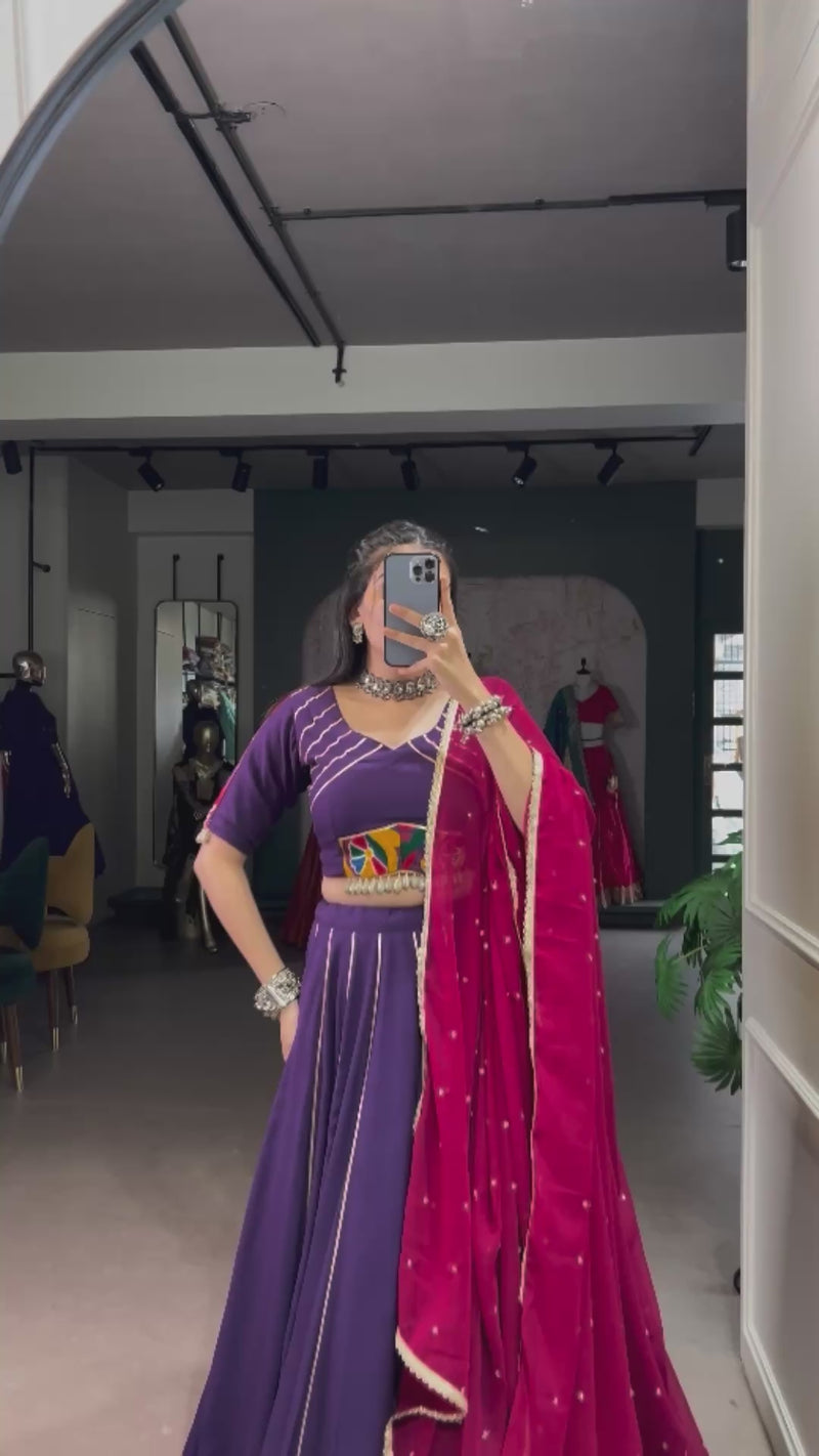 Womenline Plum Color Rayon Embossed Navratri Lehenga Choli